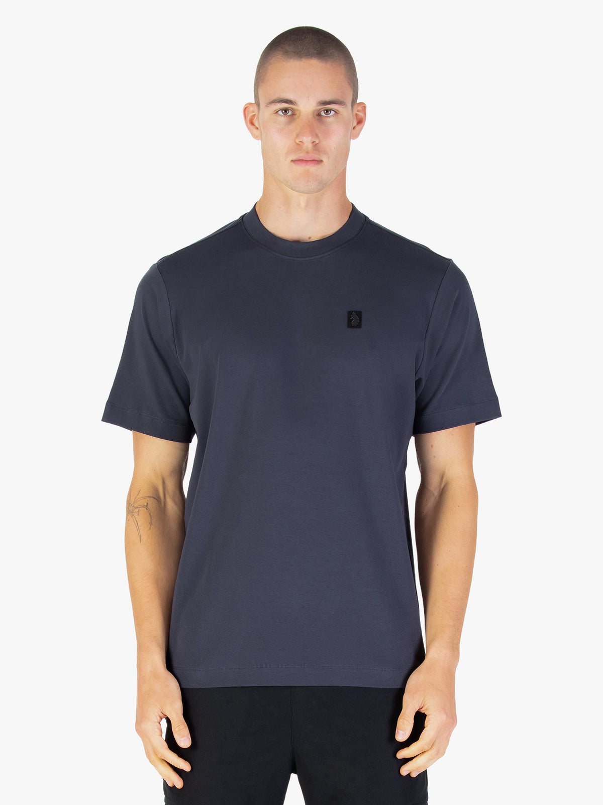 Men's relaxed-fit grey t-shirt with crew neck and short sleeves worn by a model - side view.