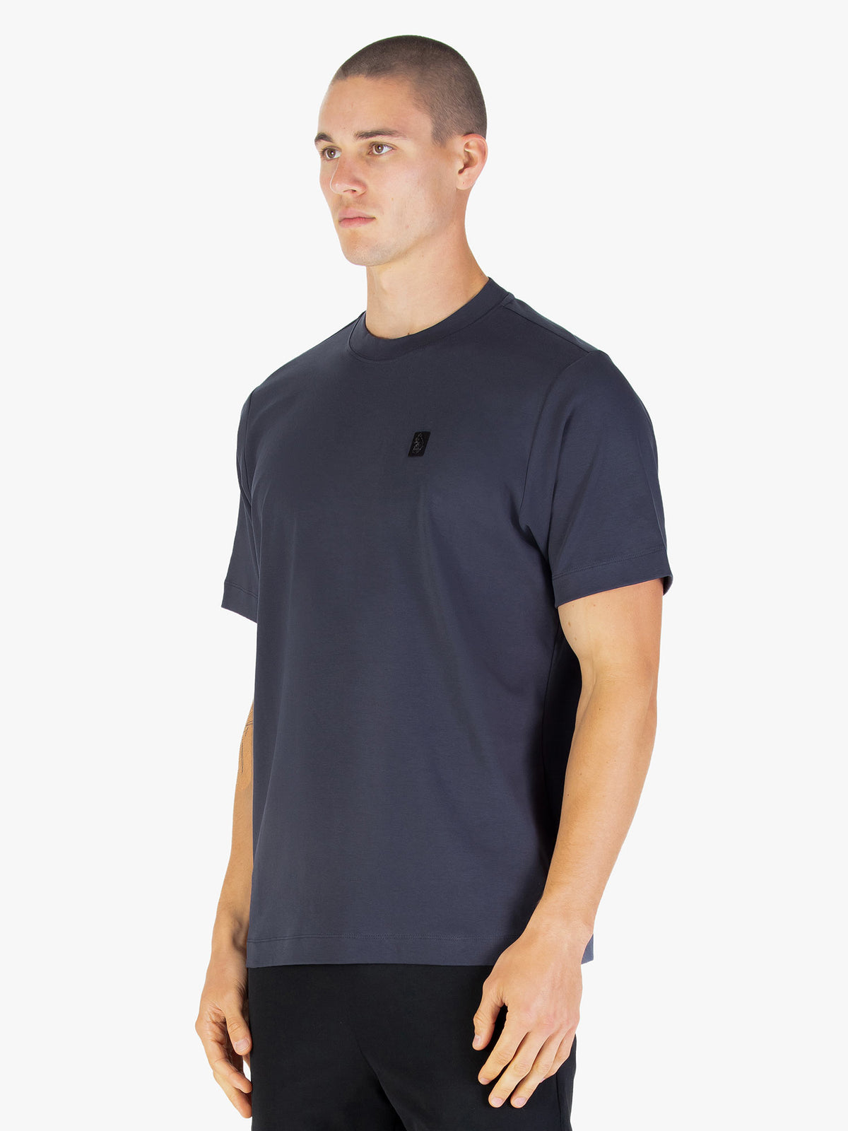 Men's relaxed-fit grey t-shirt with crew neck and short sleeves worn by a model - back view.
