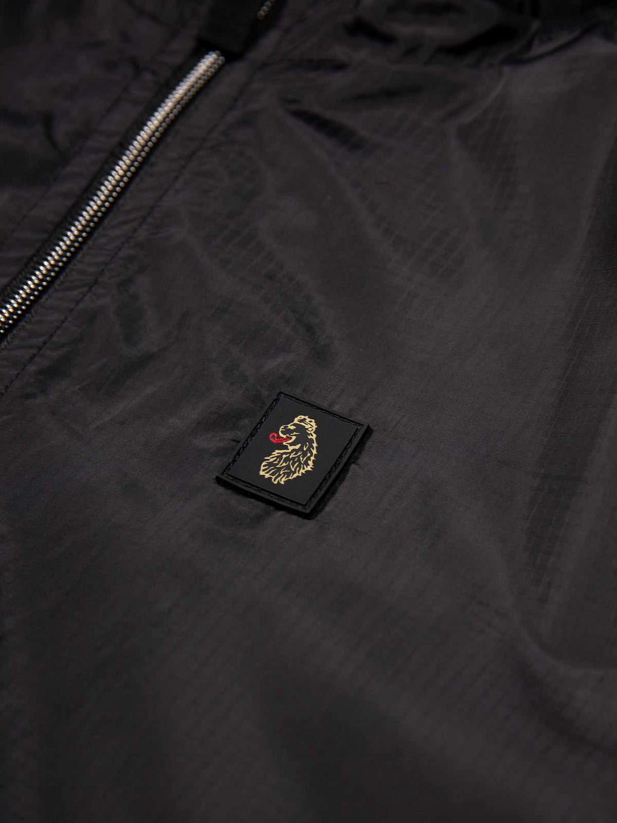 Men's black jacket with zip-up front, detail view 2