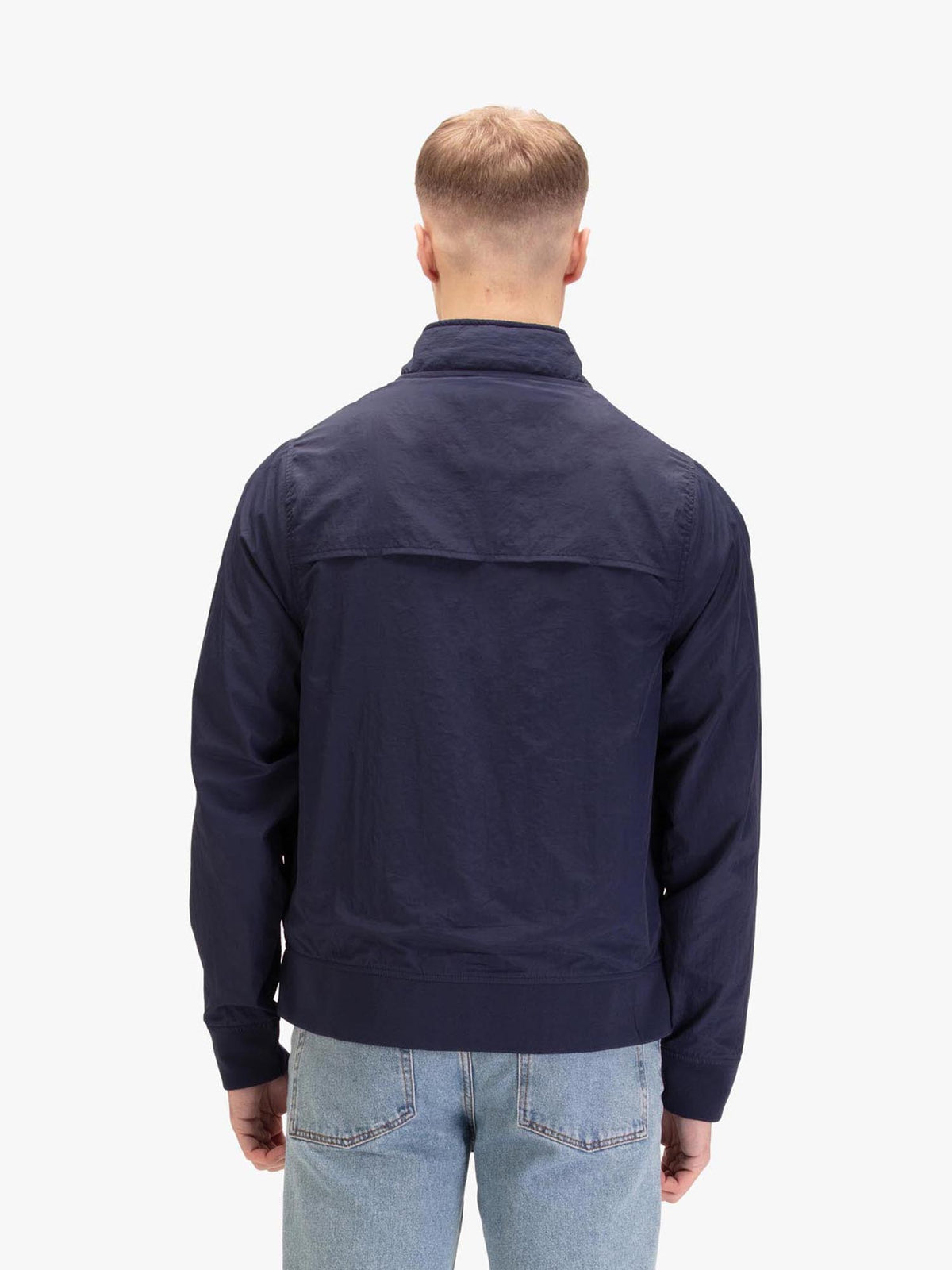 Men's navy jacket with zip-up front and front pocket, detail view 1