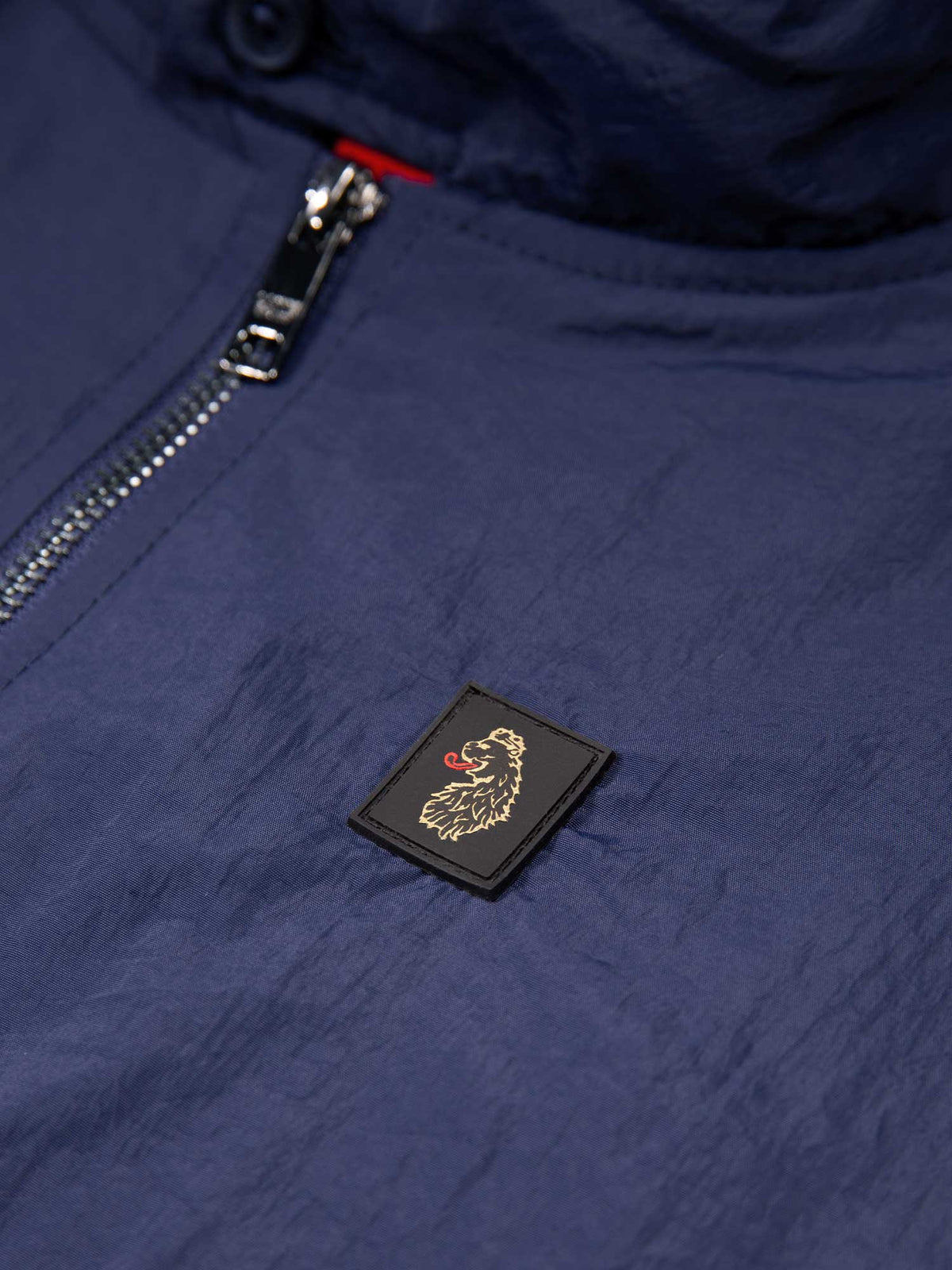 Men's navy jacket with zip-up front and front pocket, detail view 3