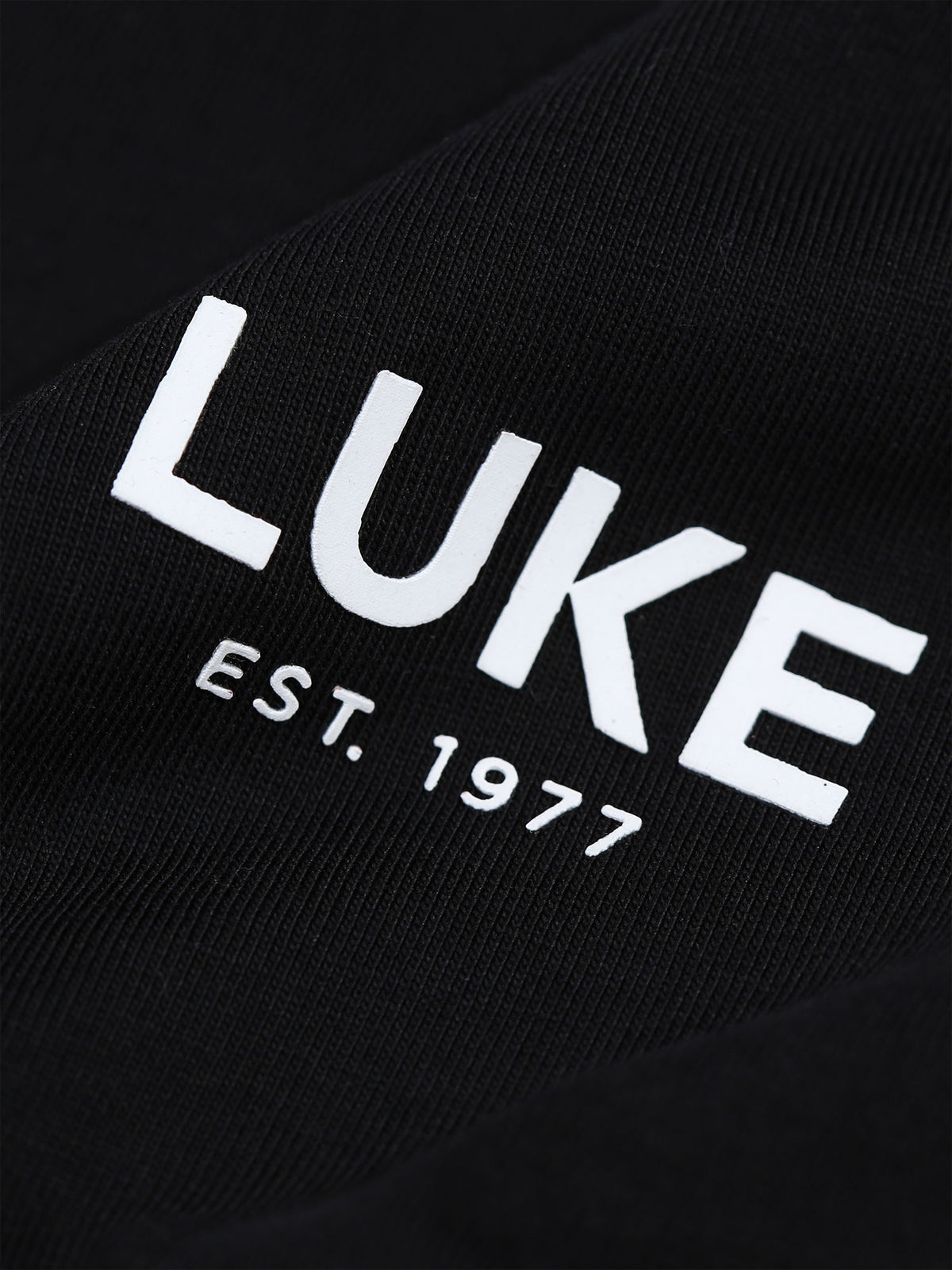 Men's relaxed-fit black t-shirt with crew neck and short sleeves, detail view