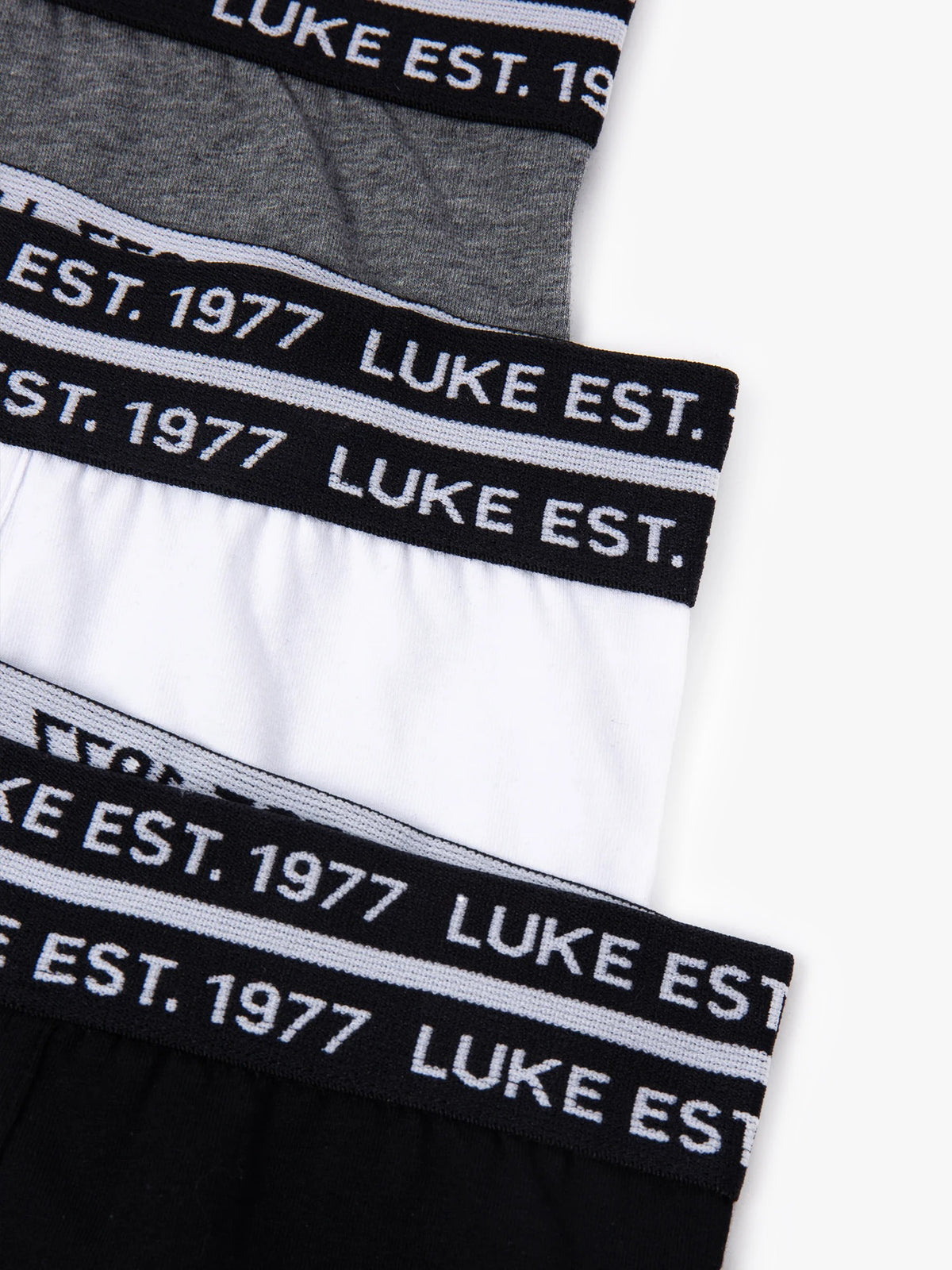 Close-up of LUKE EST. 1977 text elasticated waistbands on Captain 3 pack boxers