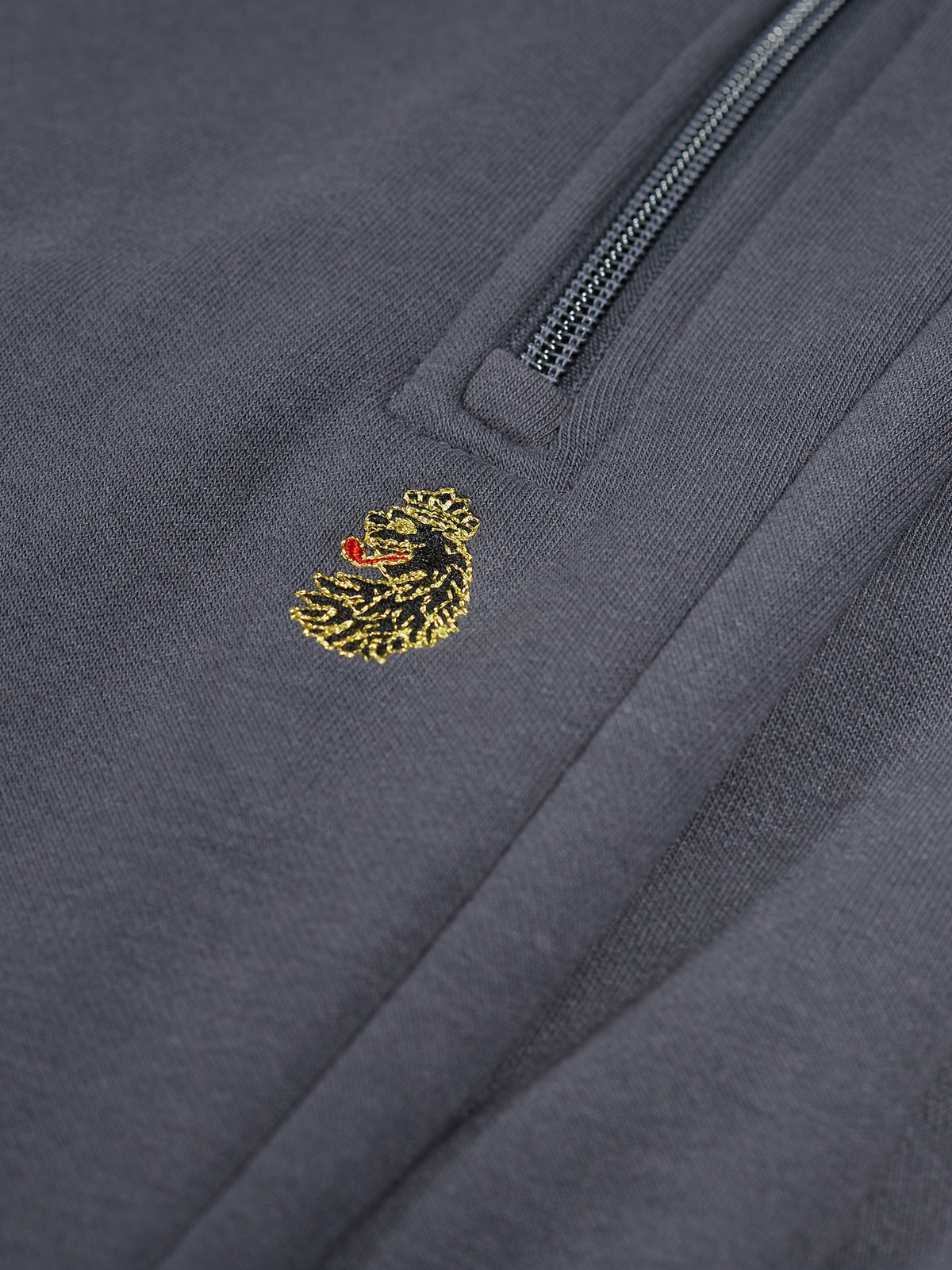 Men's grey tracksuit with crew neck sweatshirt and matching joggers.