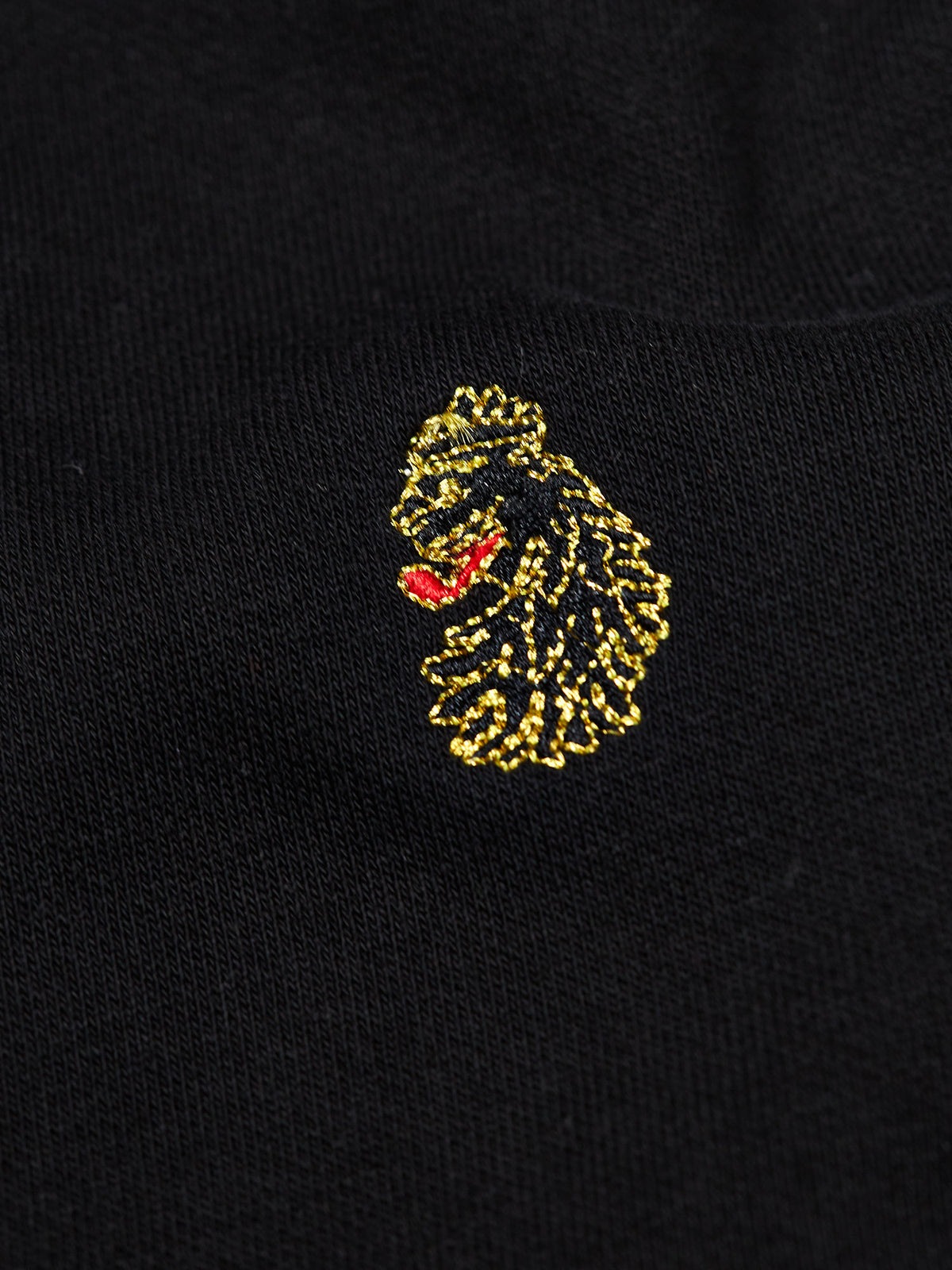 Men's black tracksuit with zip-up hoodie and matching joggers.