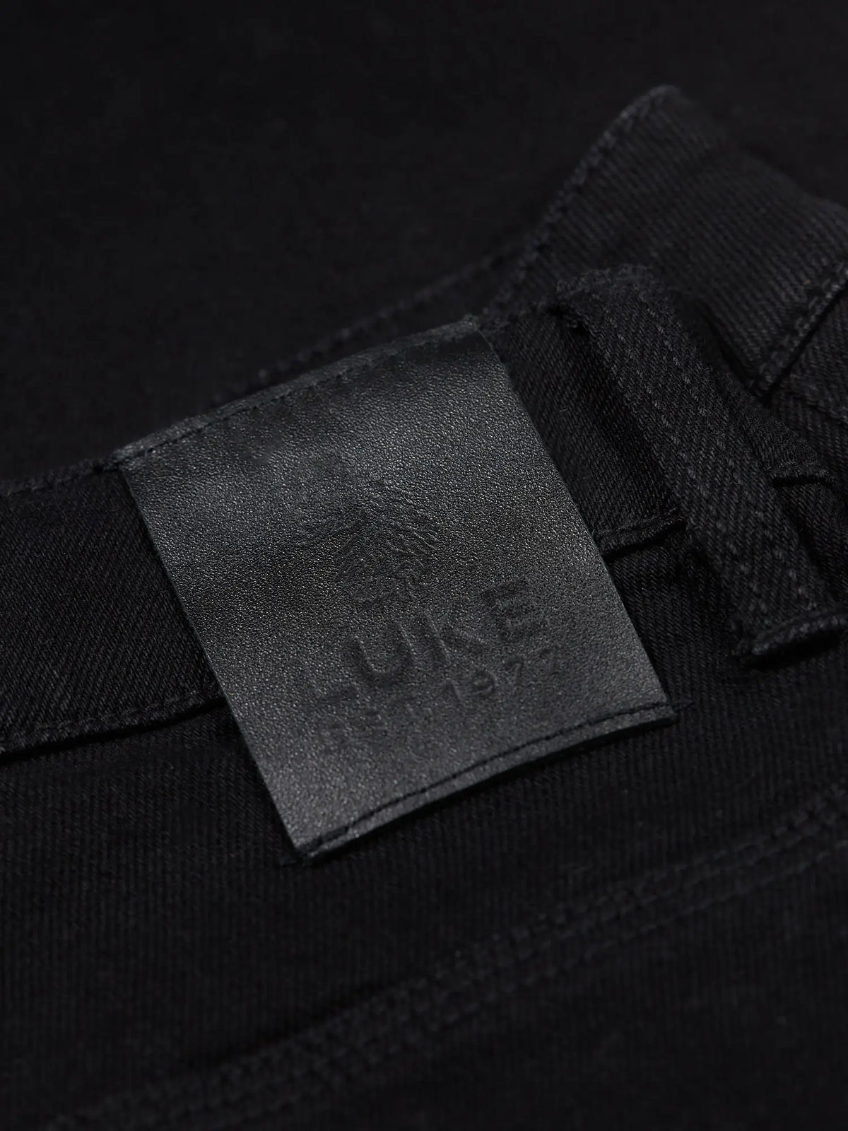 Men's black jeans.