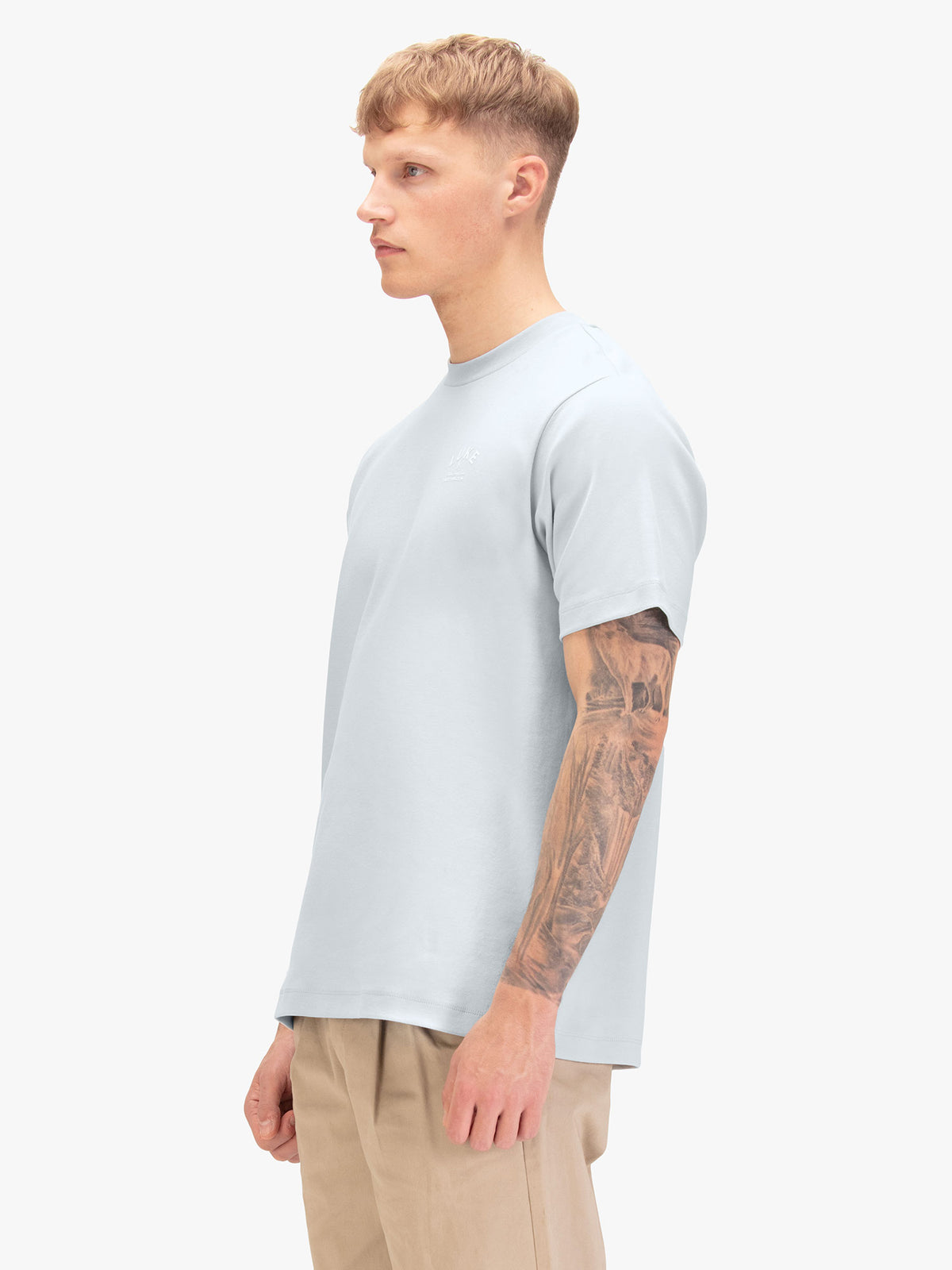 Men's relaxed-fit blue t-shirt with crew neck and short sleeves, back view
