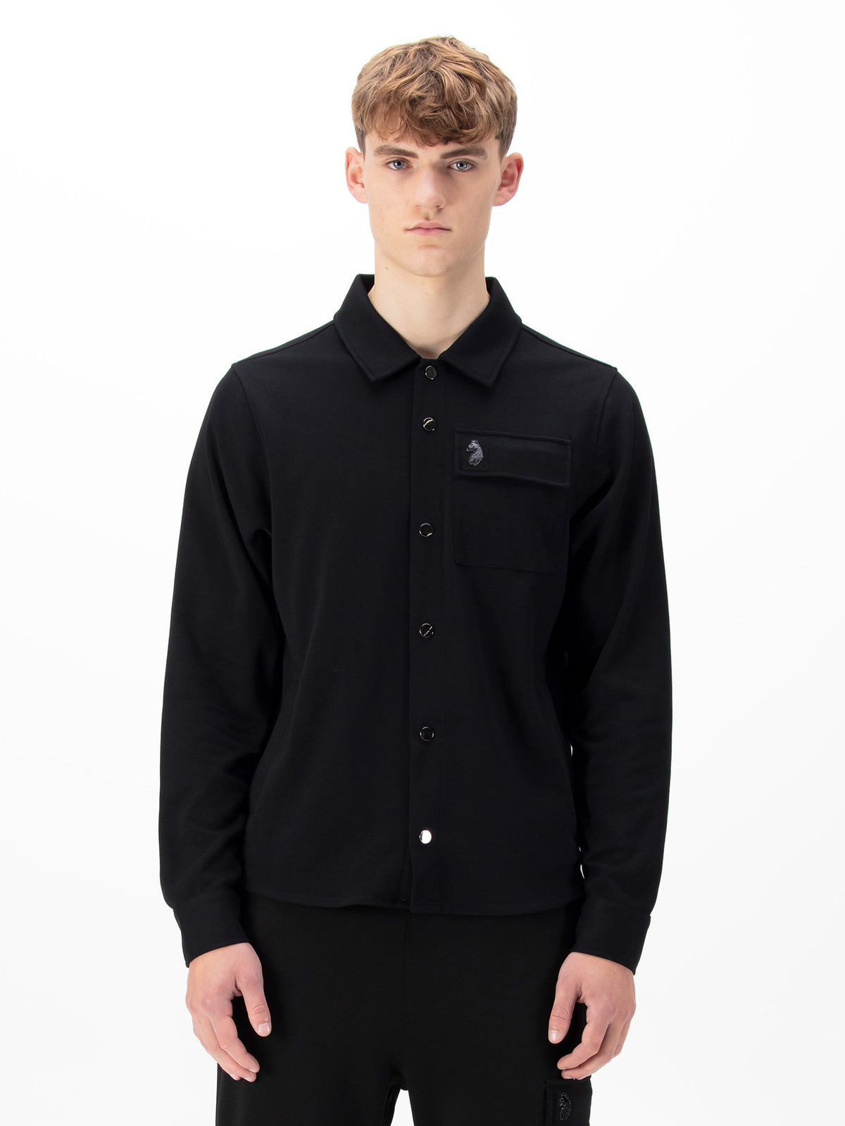 Men's black shirt with button-up front.