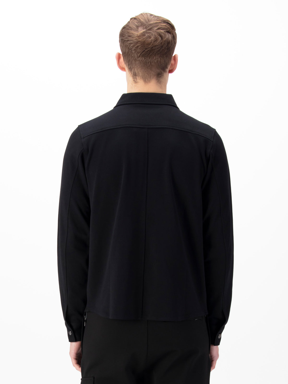 Men's black shirt with button-up front.
