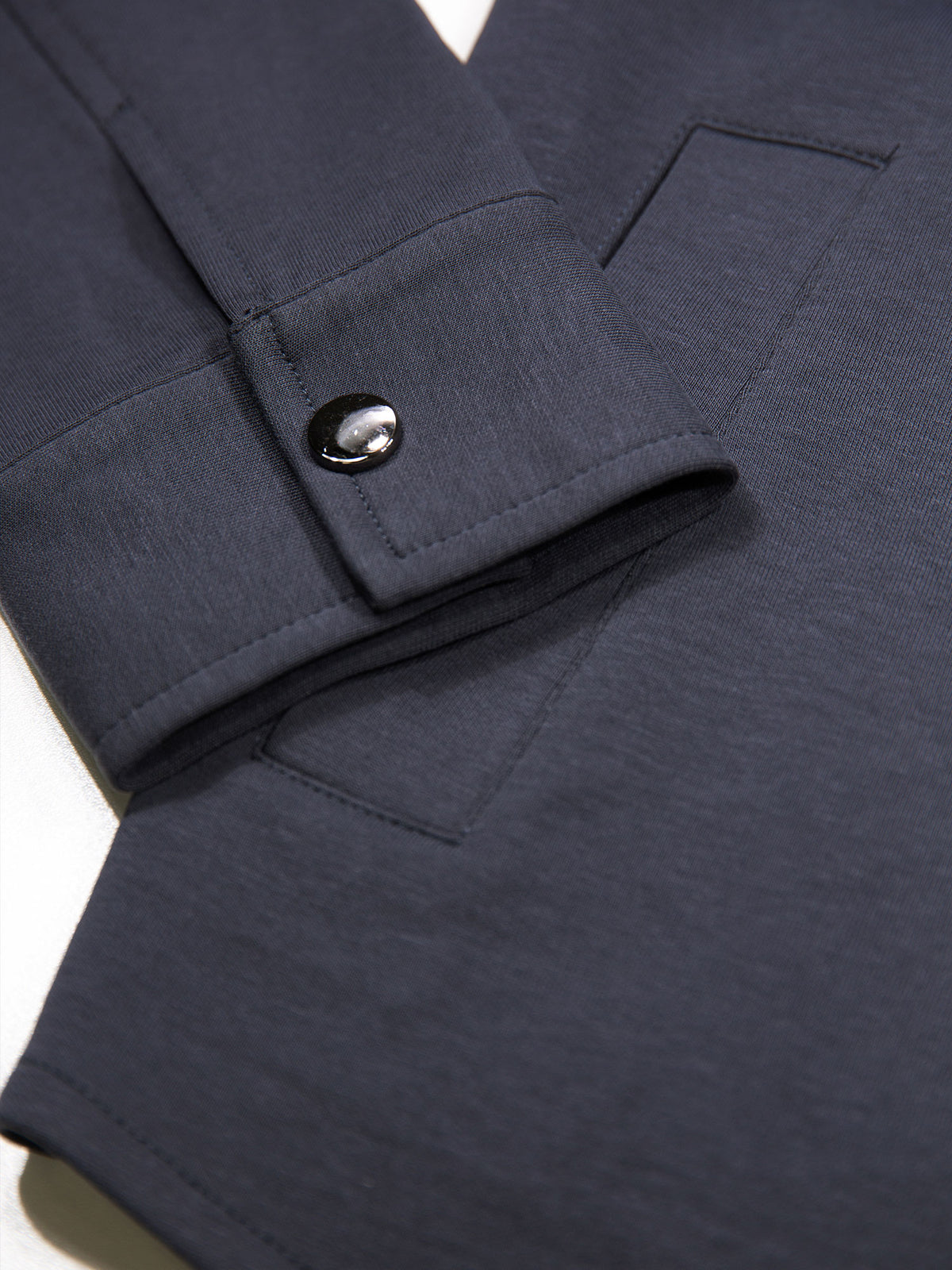 Men's grey shirt with button-up front.