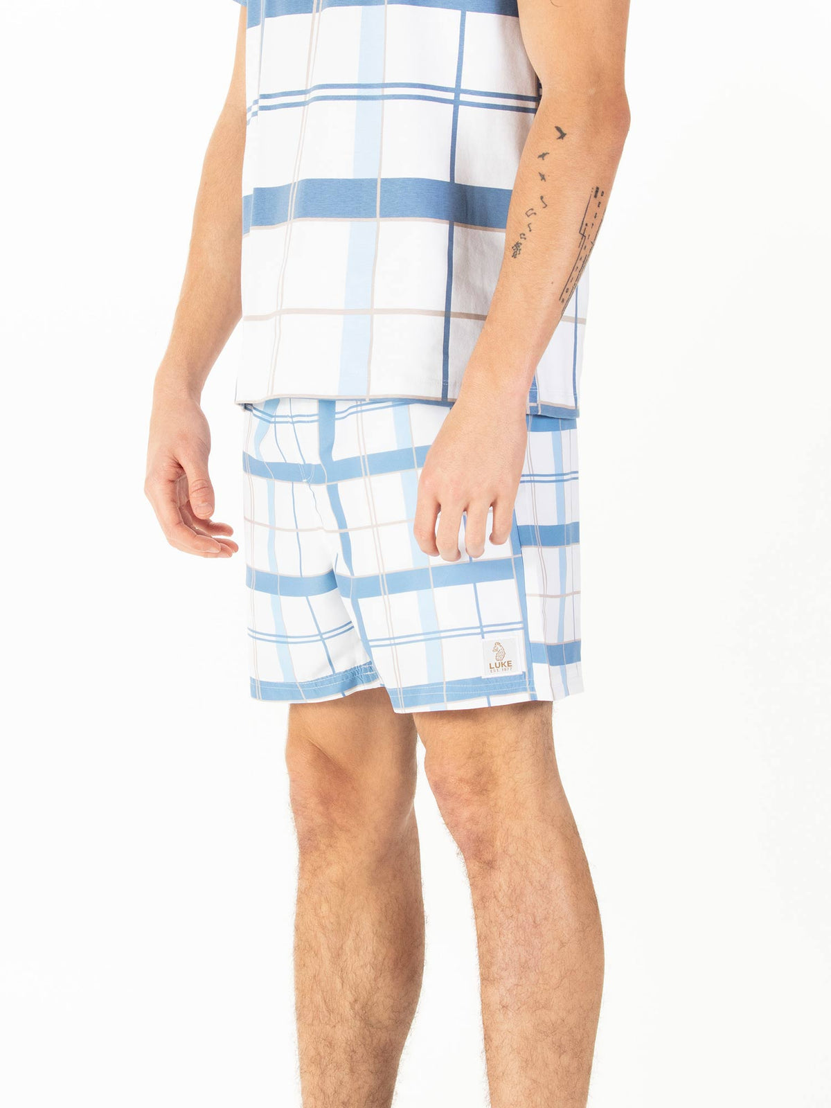 Men's white swim shorts with drawstring waistband.