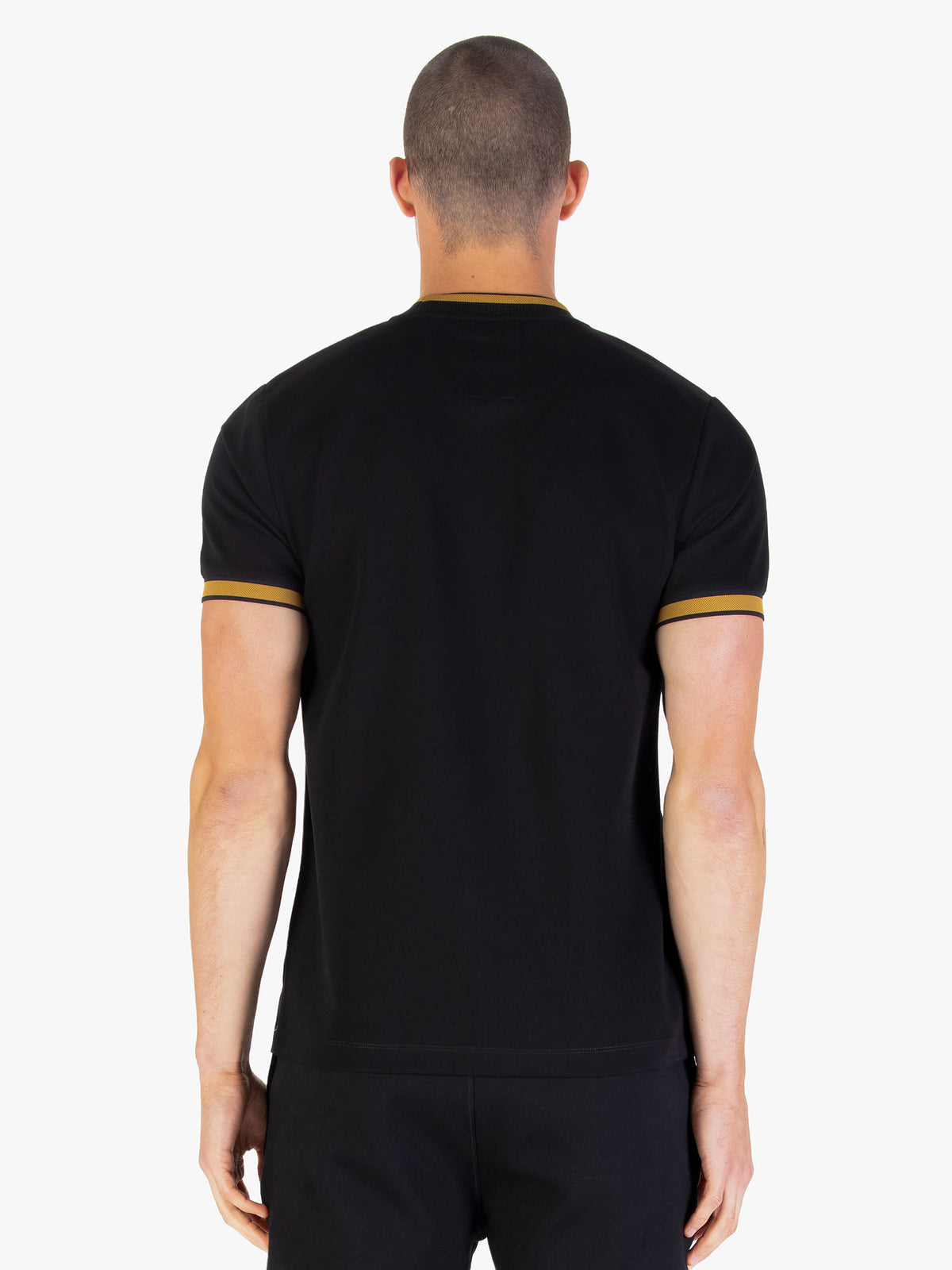 Men's black t-shirt with crew neck and short sleeves, worn by a model, back view
