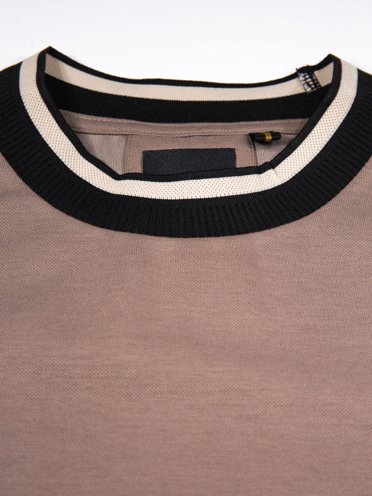 Men's brown t-shirt with crew neck and short sleeves worn by a model - back view.