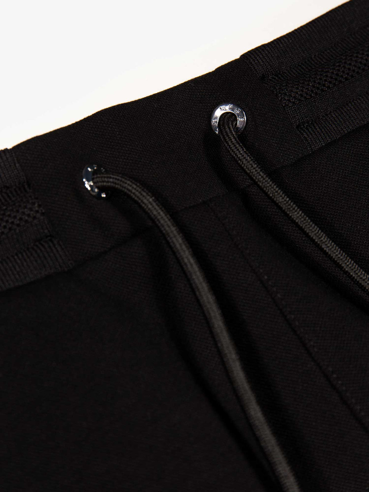 Men's black shorts with drawstring waistband, detail view 2