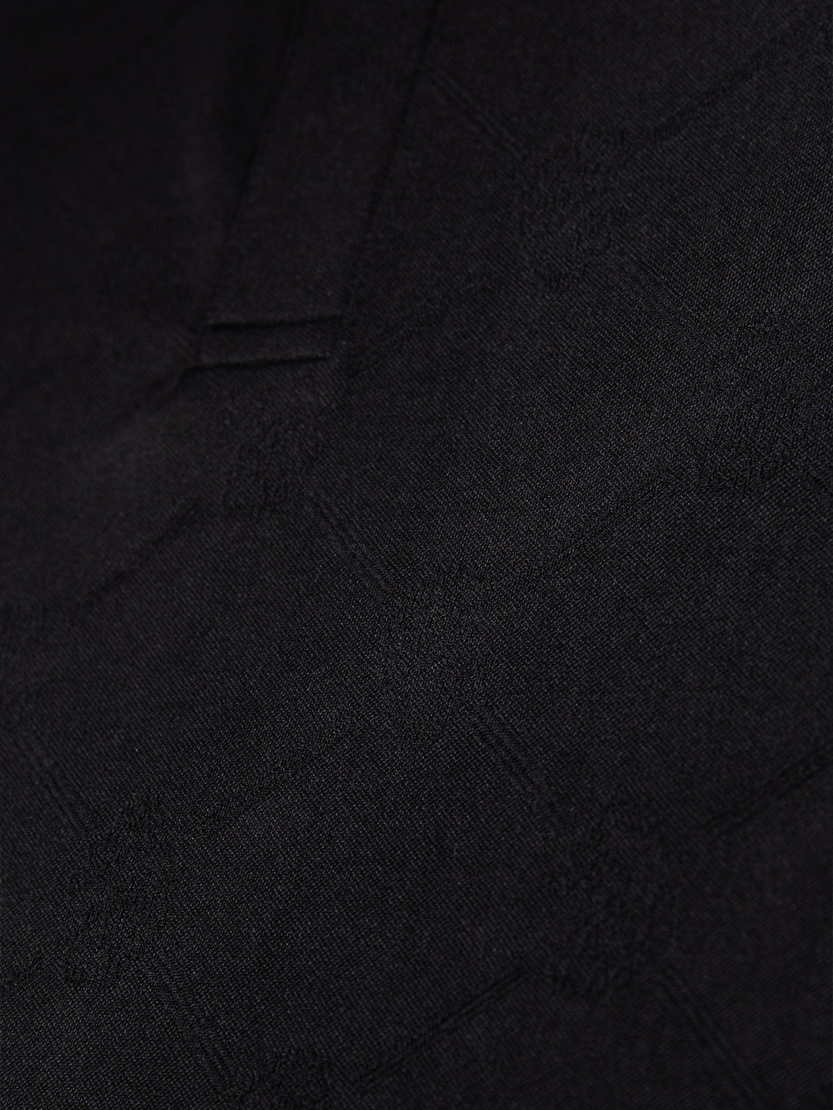 Men's black polo shirt with polo collar.