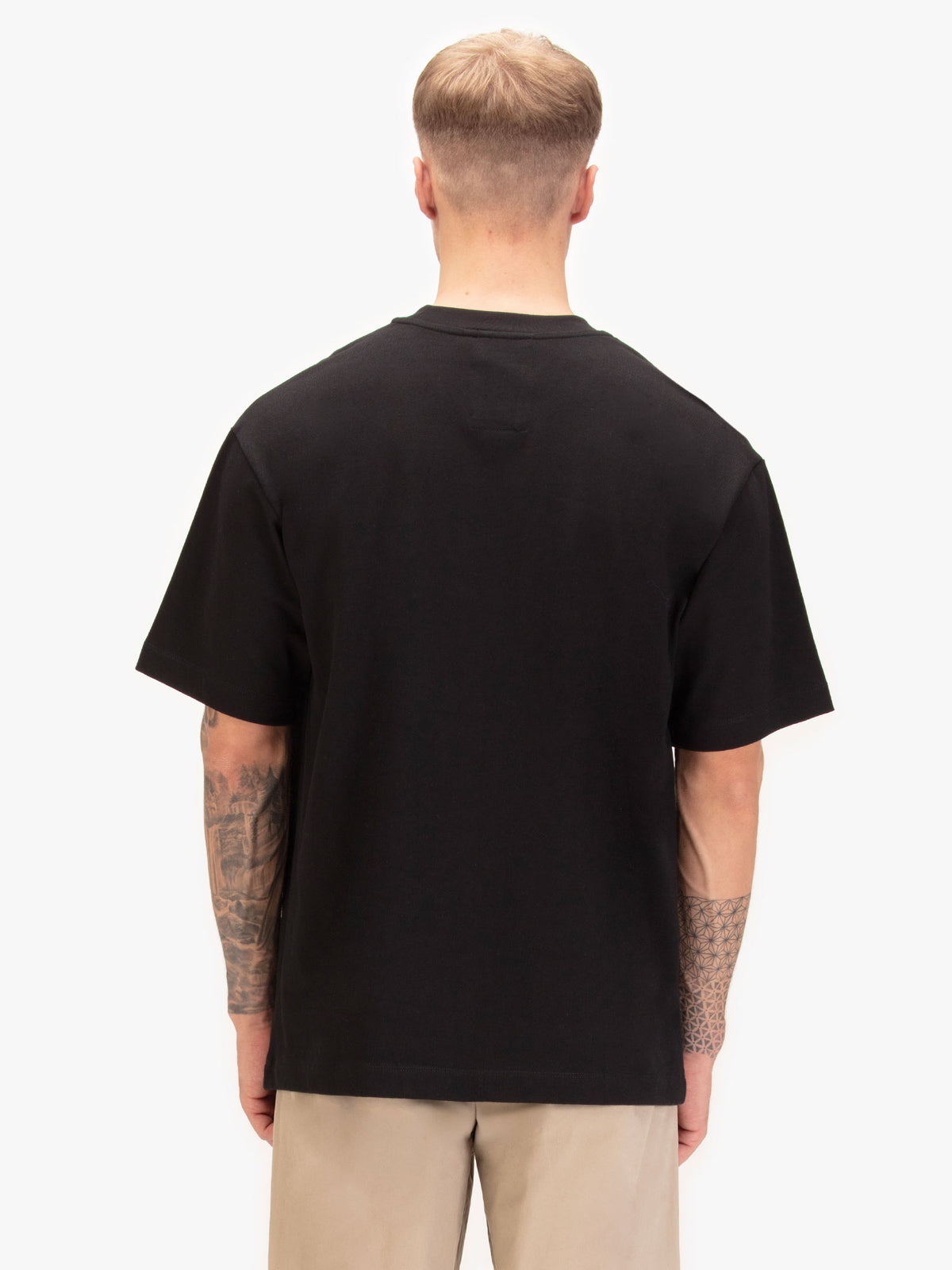 Back view of black LUKE 1977 Clarke relaxed fit t-shirt worn by model