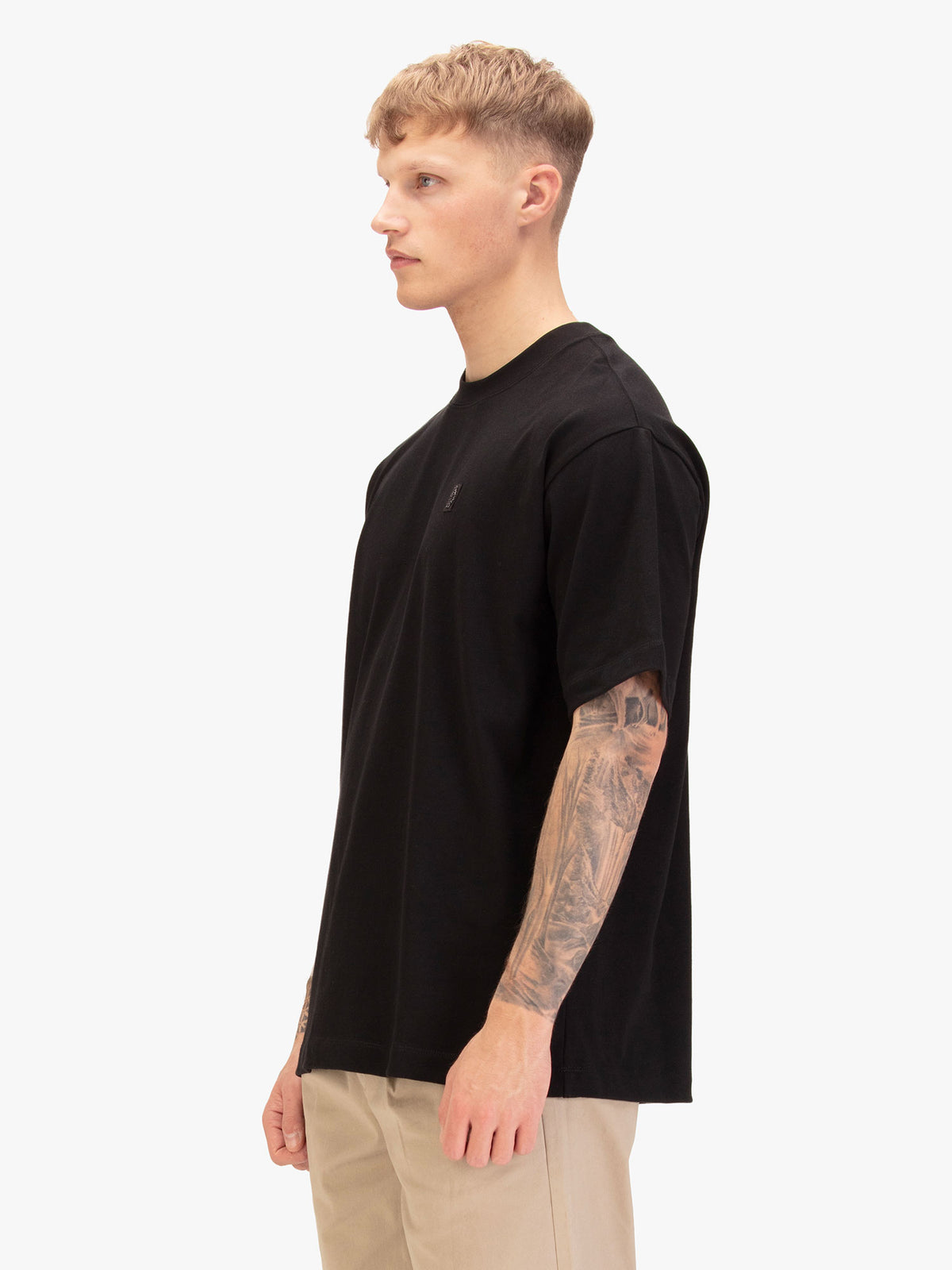 Side view of man wearing black LUKE 1977 Clarke relaxed fit cotton t-shirt