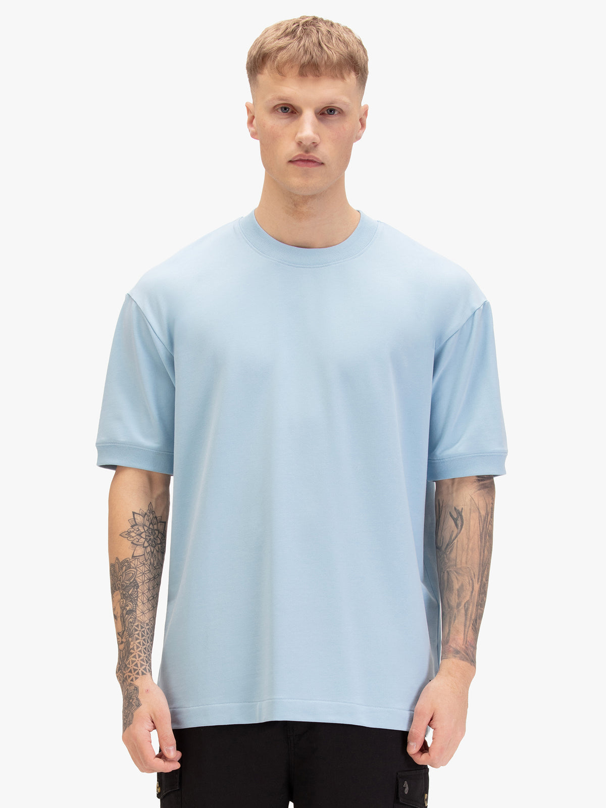 Men's relaxed-fit blue t-shirt with crew neck and short sleeves, worn by a model, front view