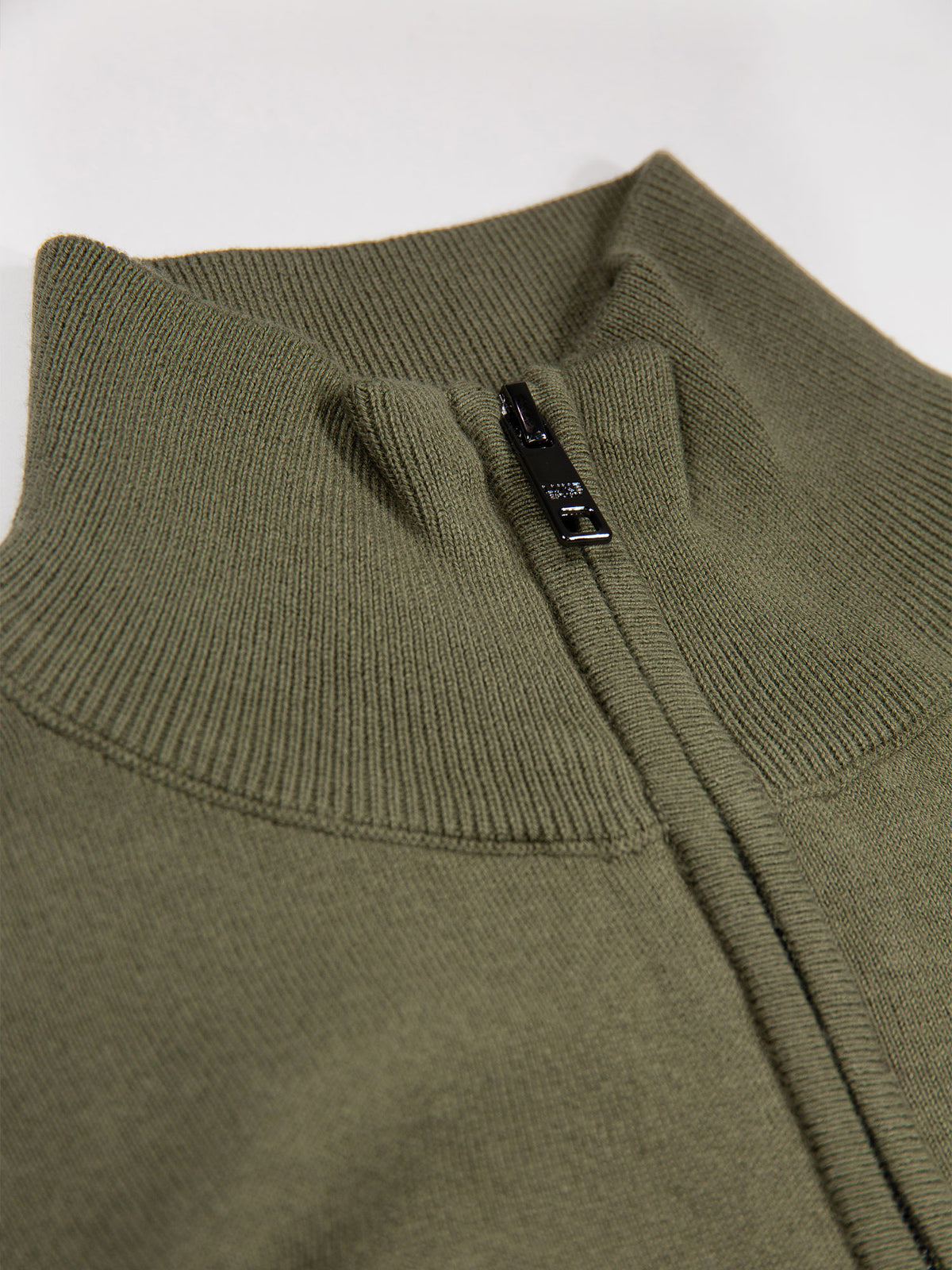 Men's green jumper.