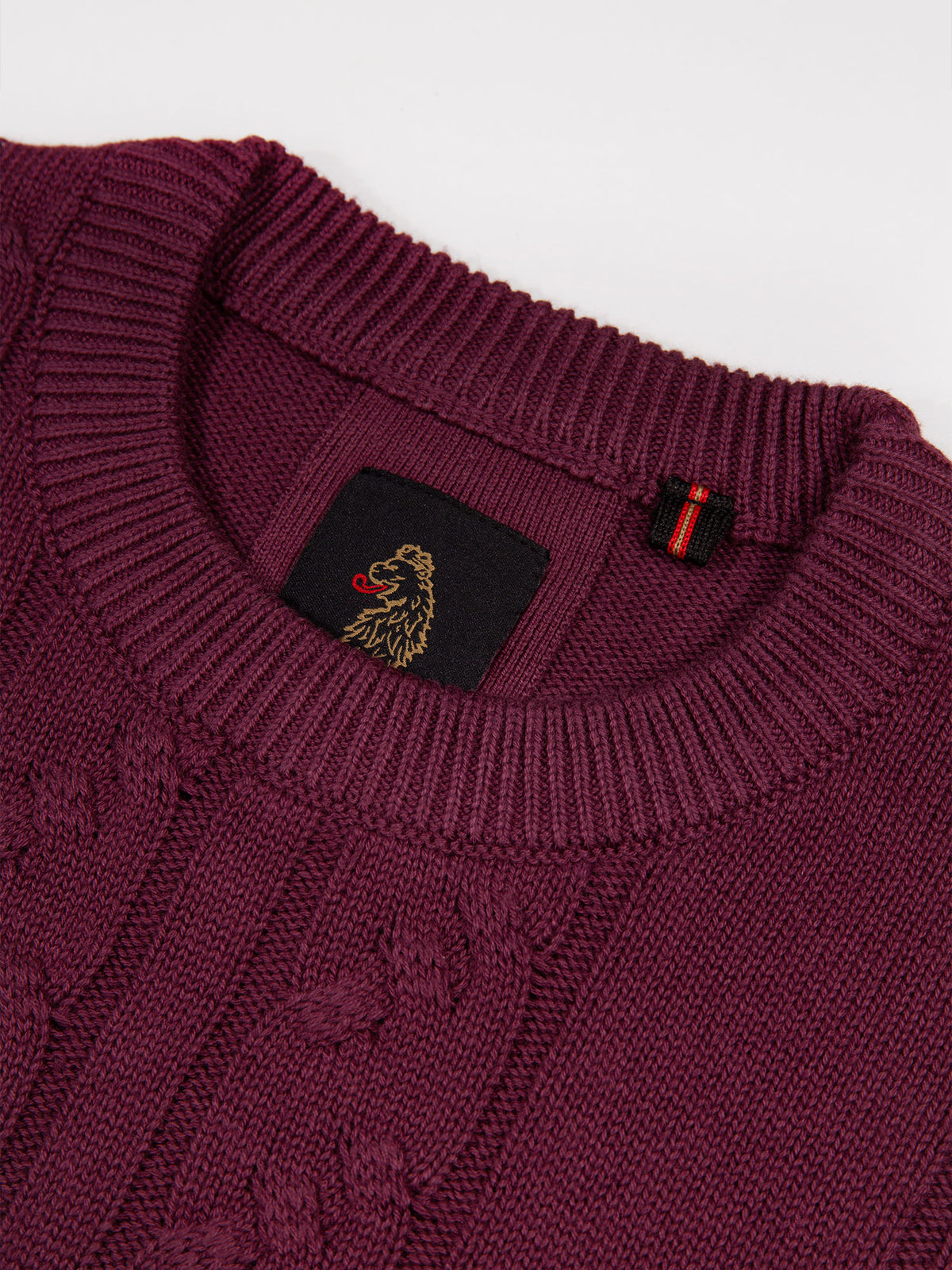 Men's red jumper.