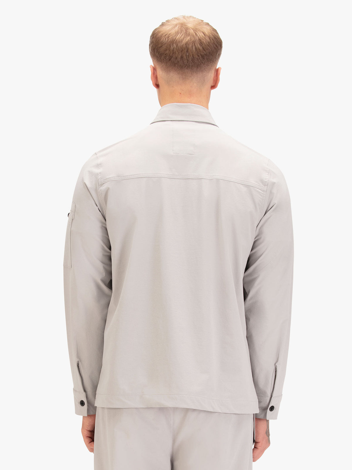 Men's grey shirt with button-up front.
