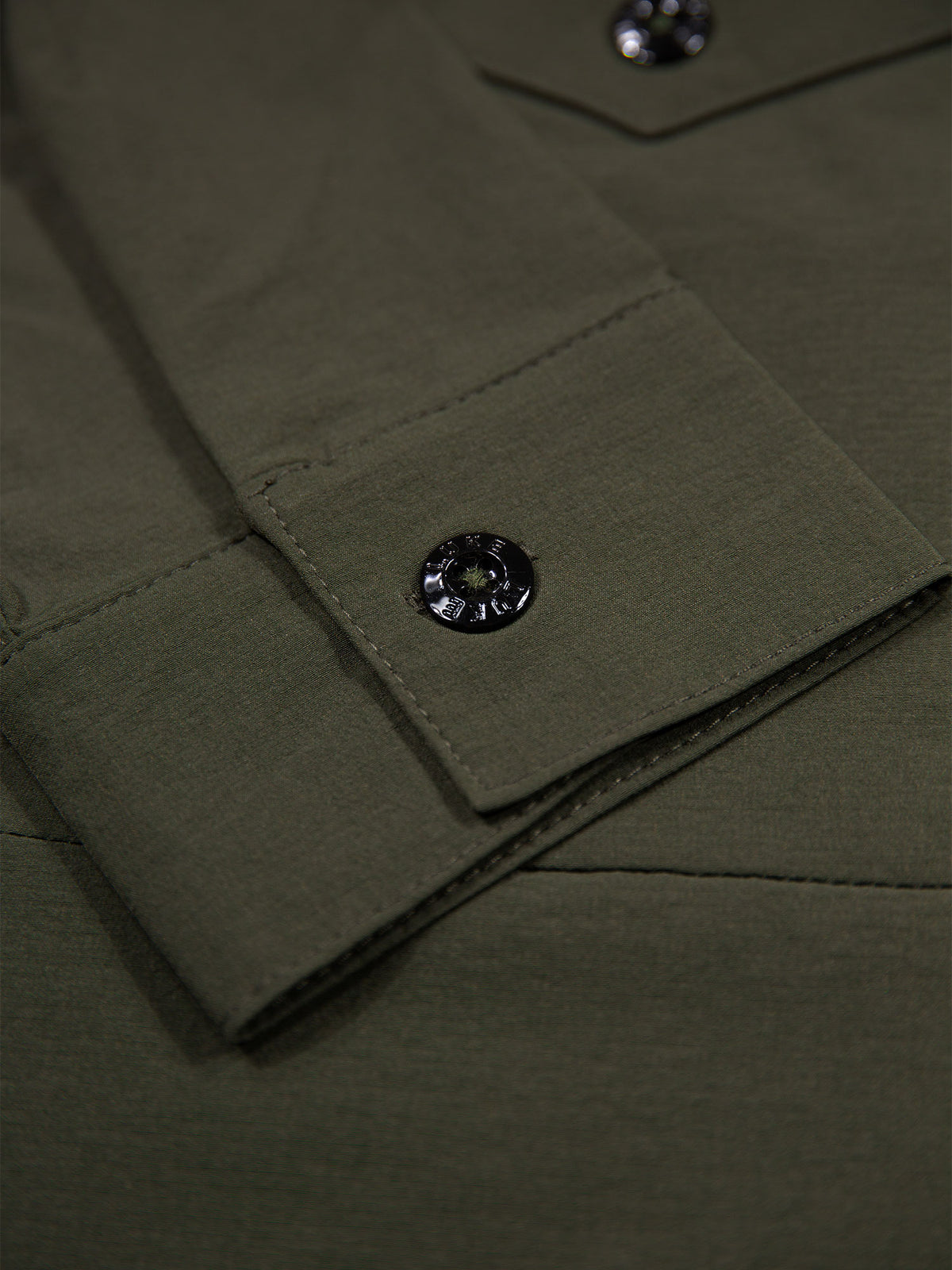 Men's green shirt with button-up front.