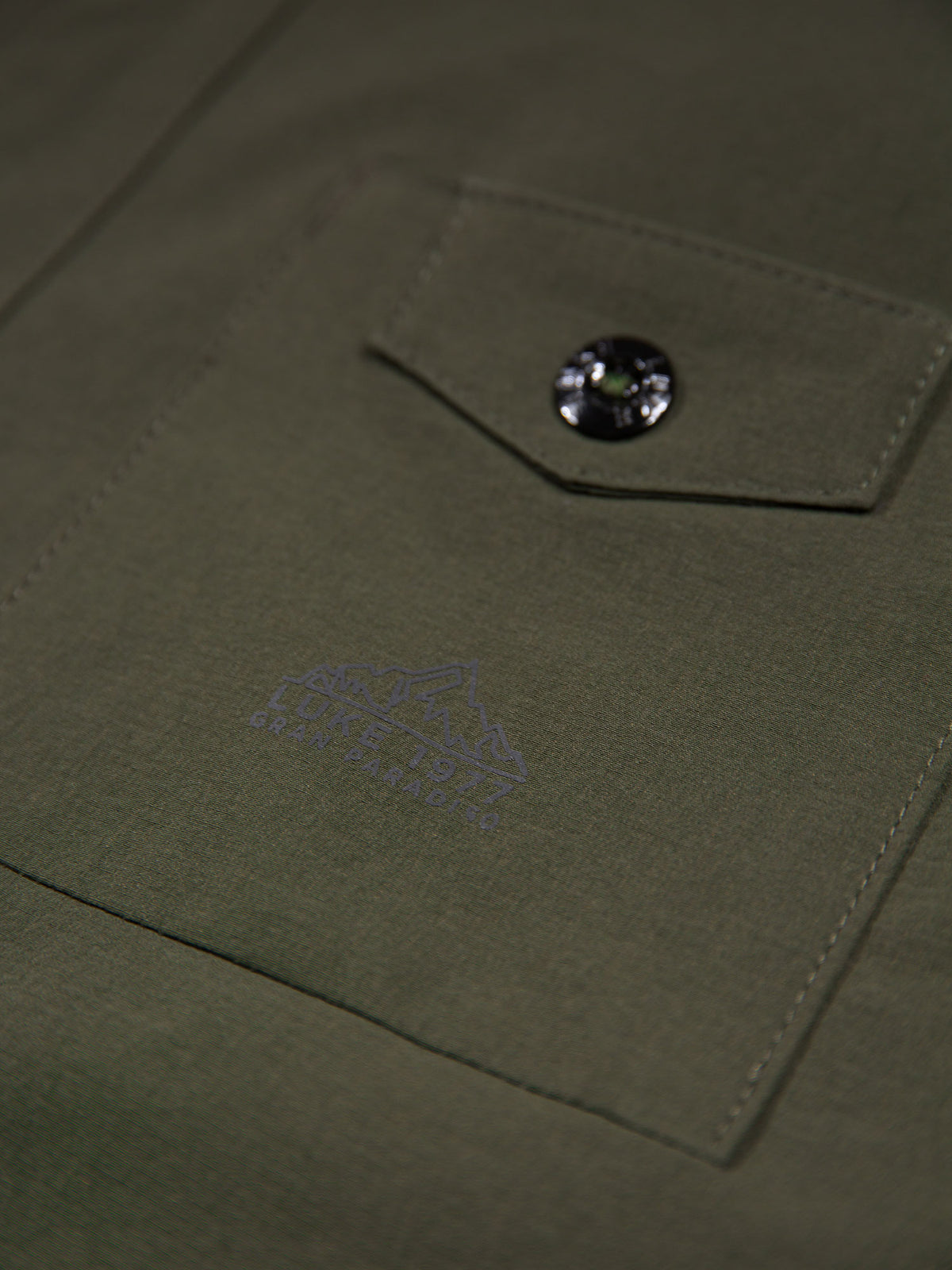 Men's green shirt with button-up front.
