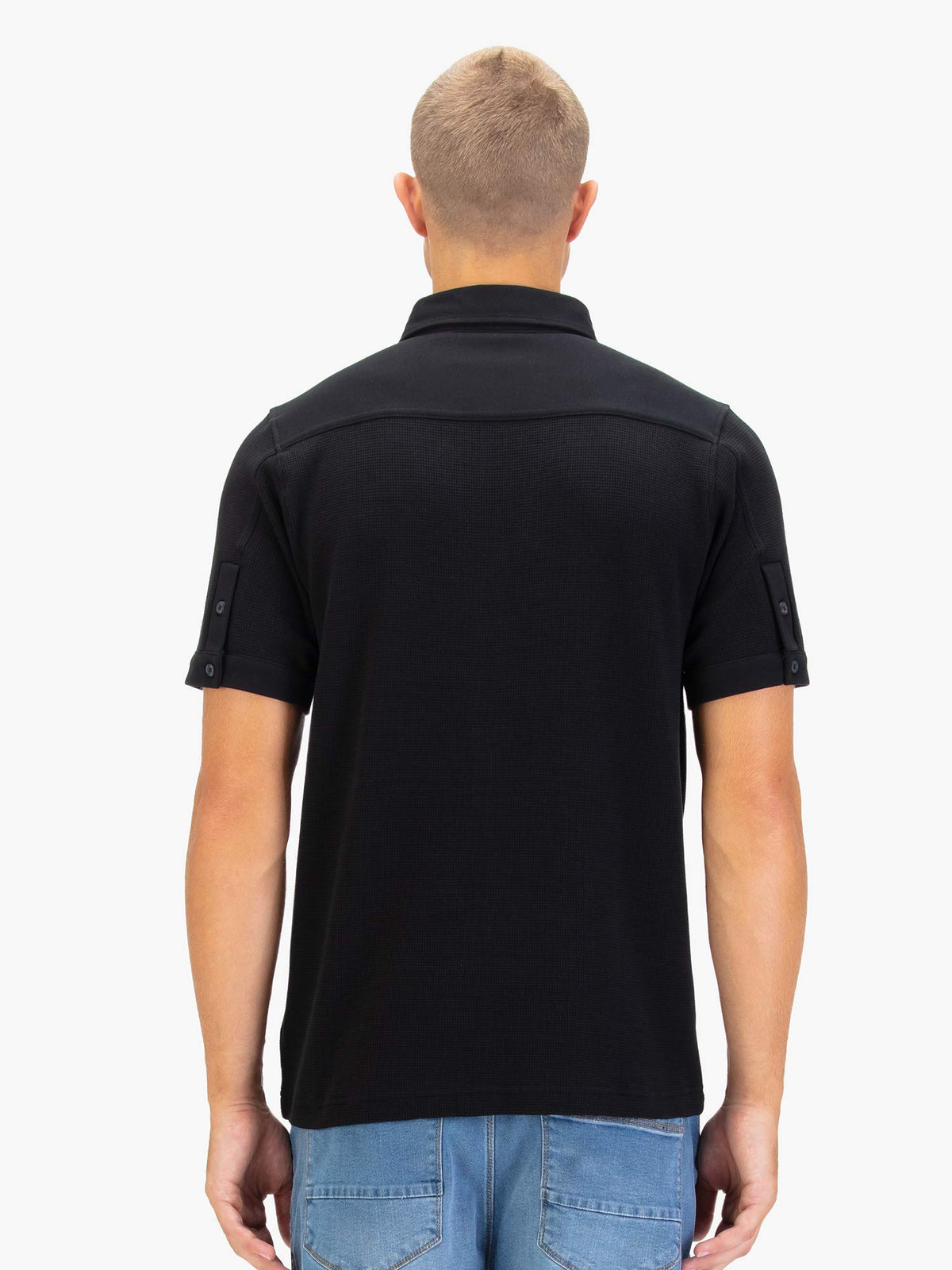 Men's black polo shirt with polo collar.