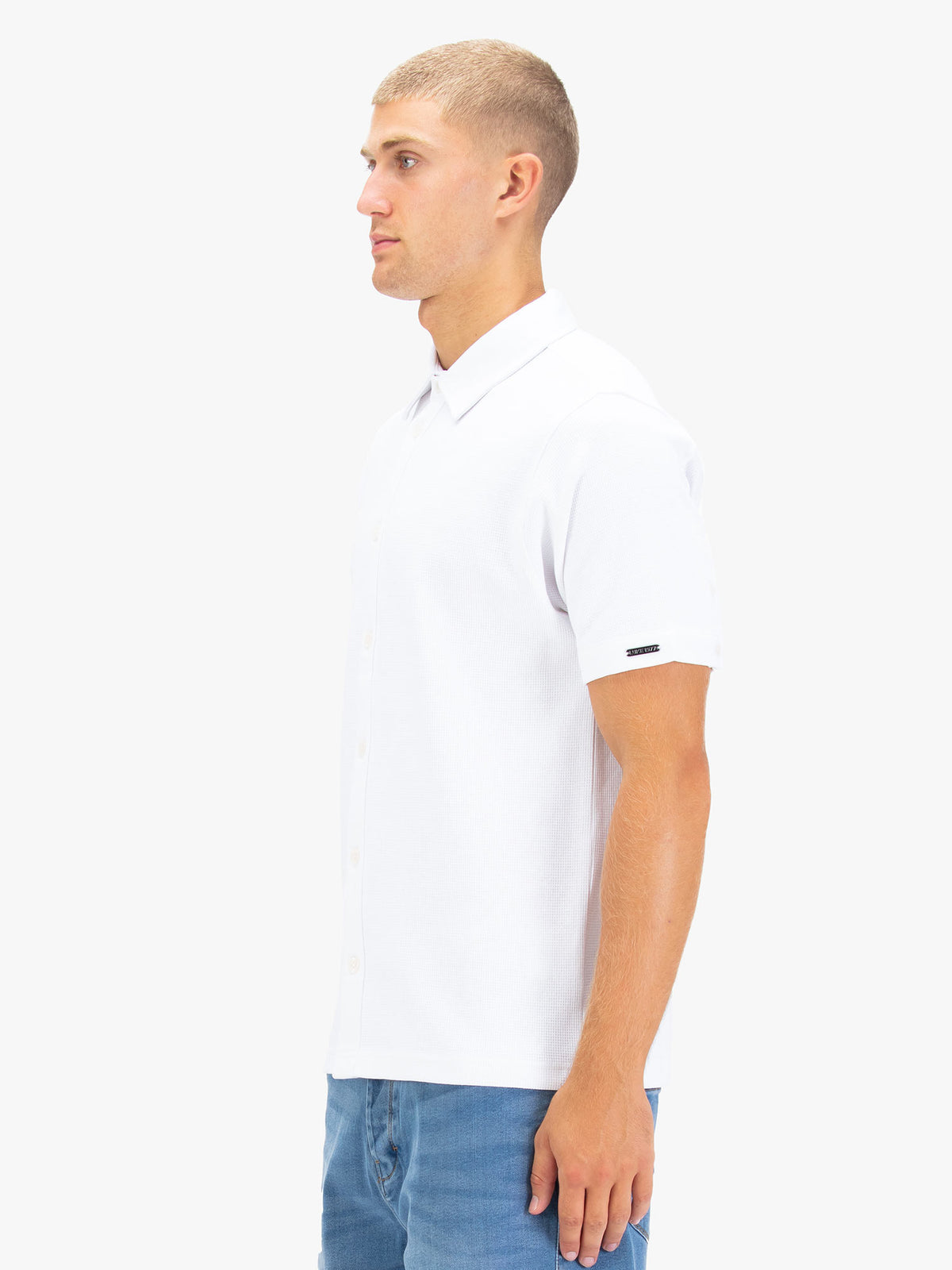 Men's white polo shirt with polo collar.