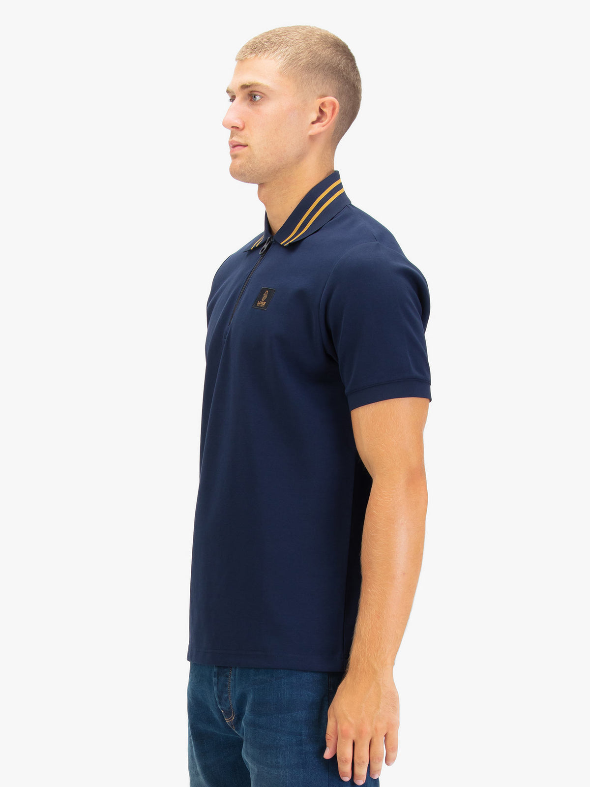 Men's navy polo shirt with polo collar.