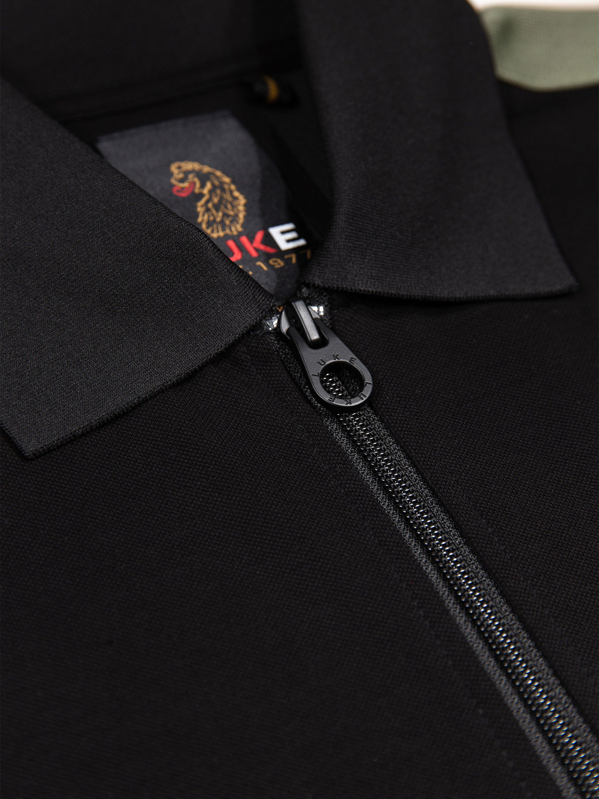 Men's black polo shirt with polo collar.