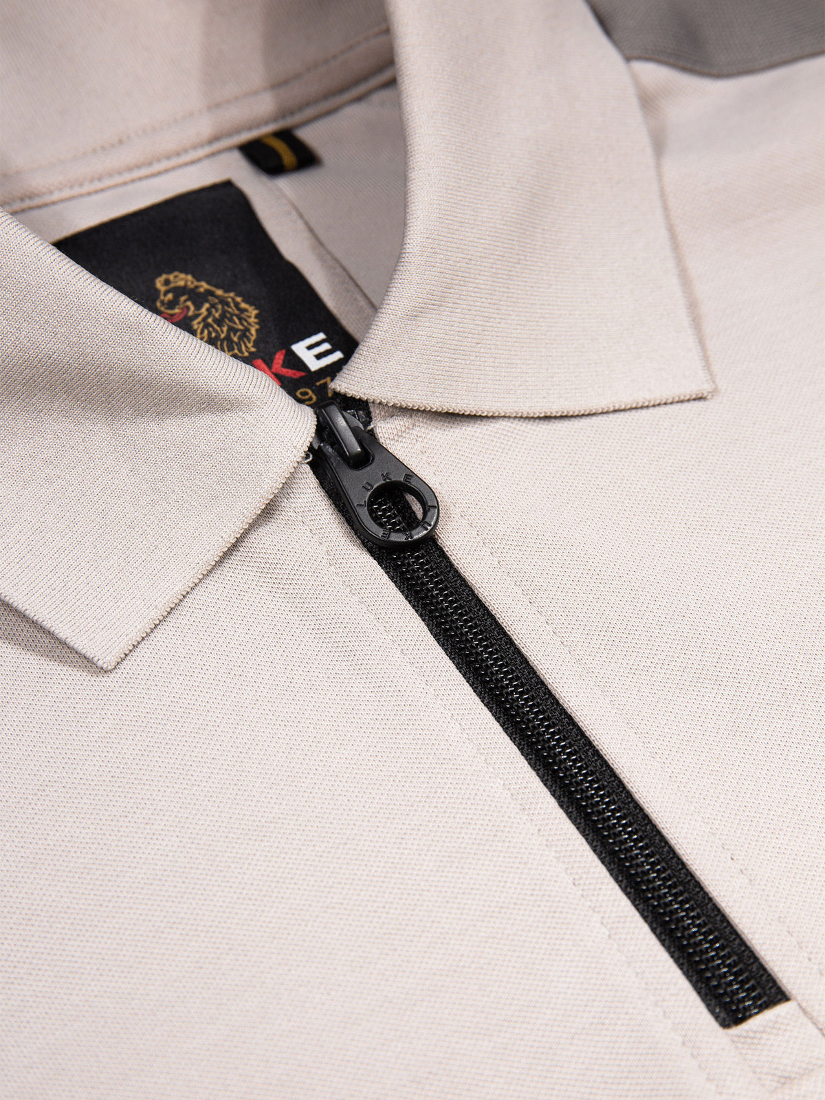 Men's grey polo shirt with polo collar.