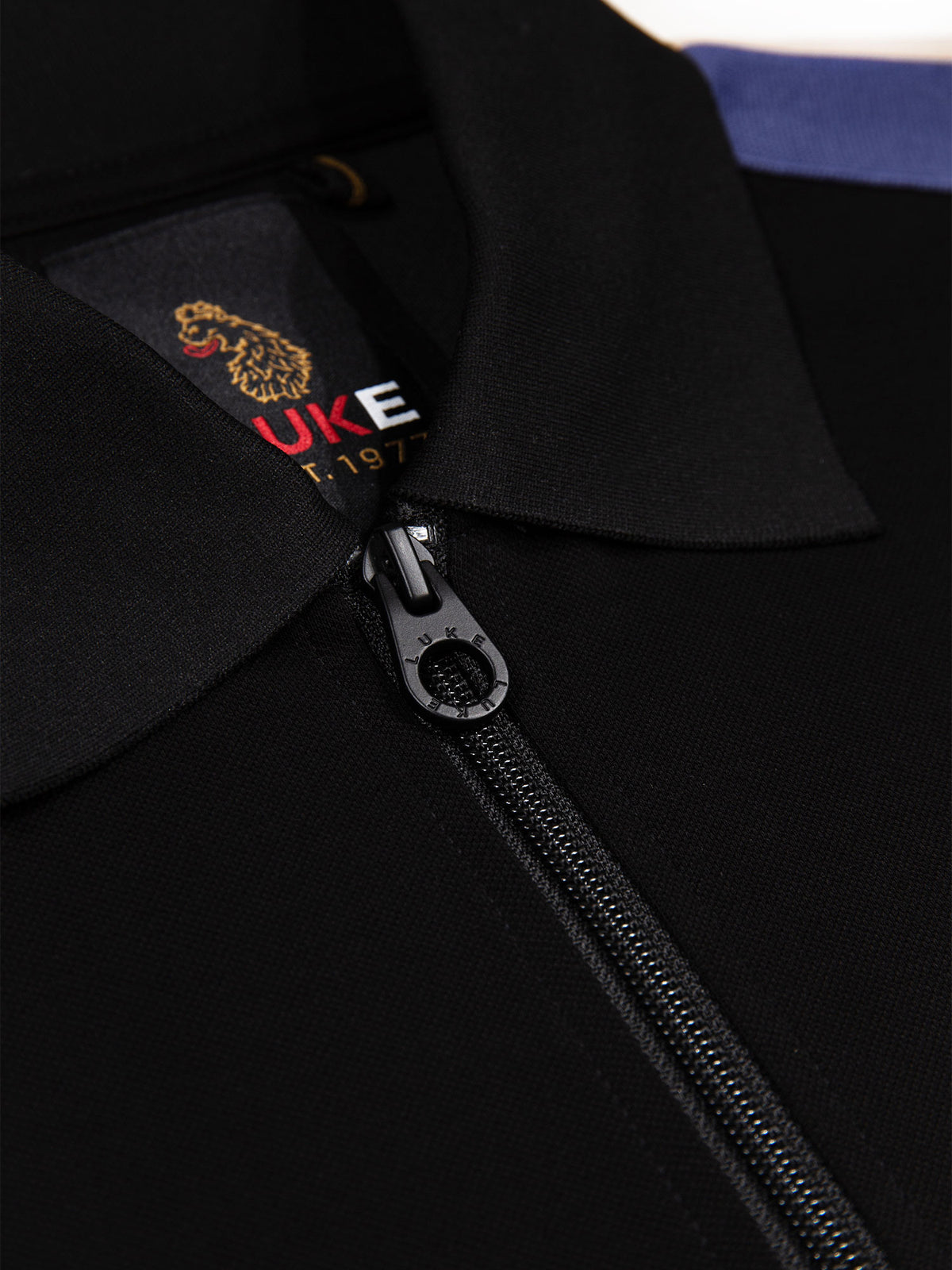 Men's black polo shirt with polo collar.