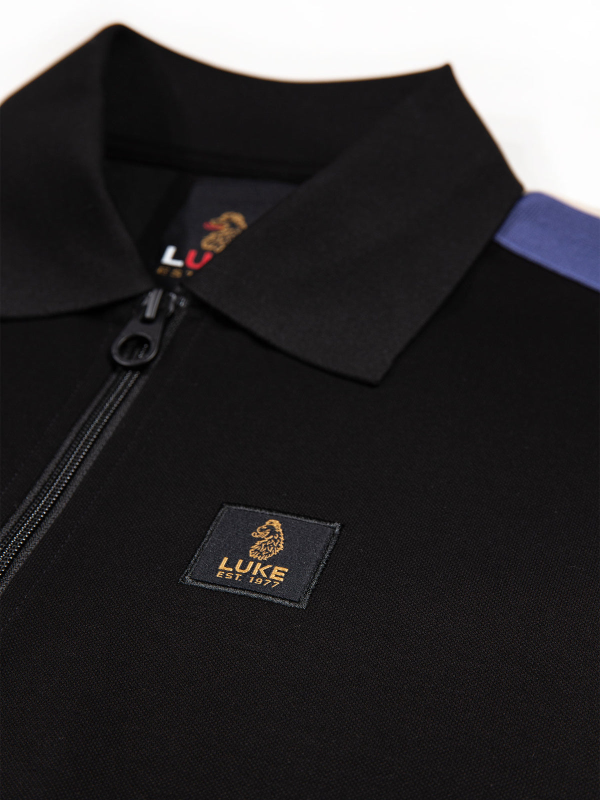 Men's black polo shirt with polo collar.