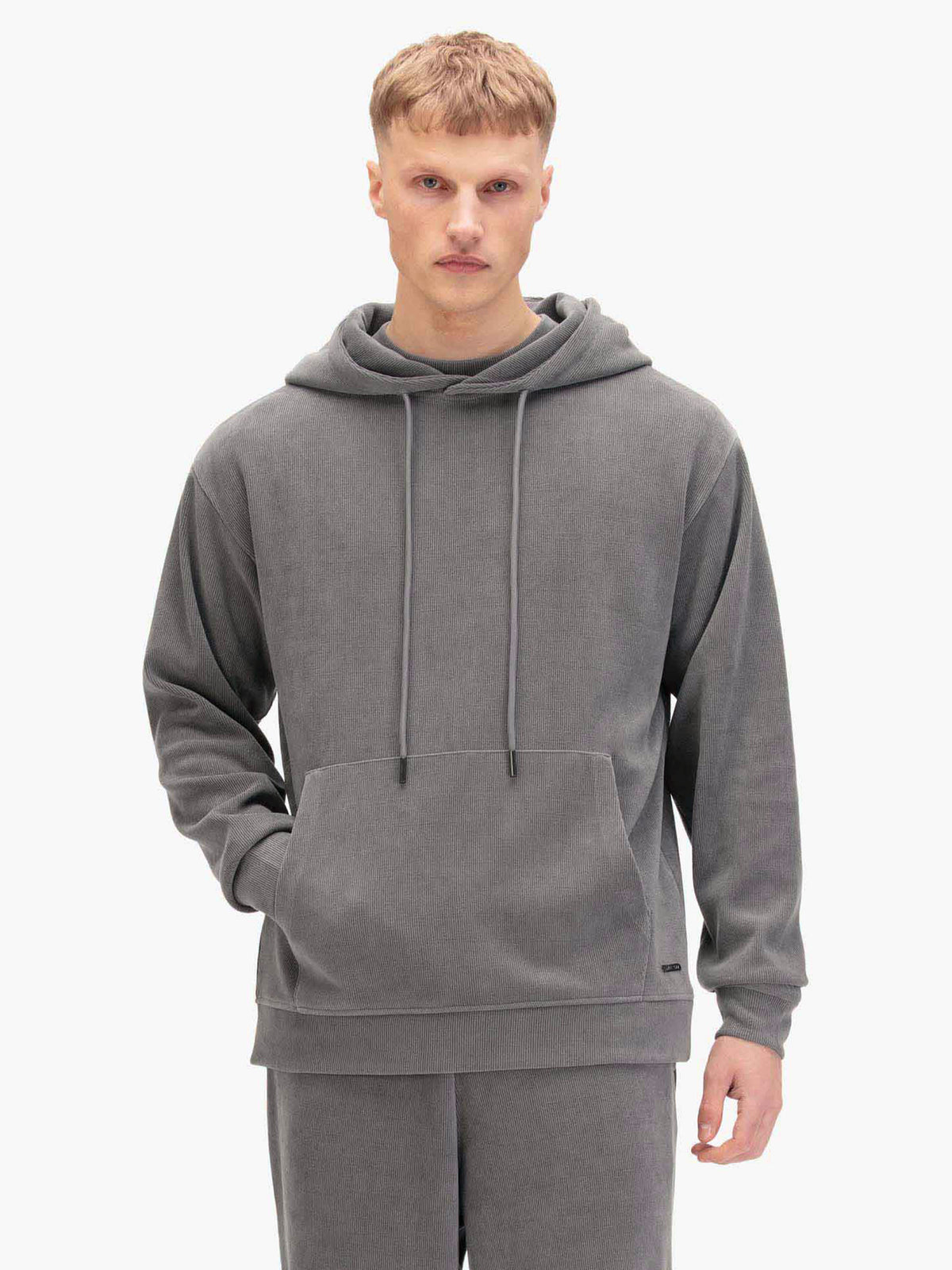 Men's relaxed-fit grey hoodie with front pocket and drawstring hood.