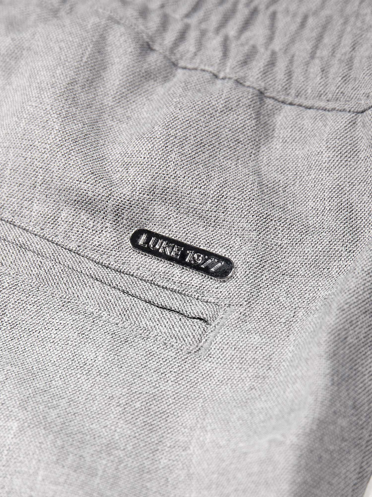 Men's straight-leg grey trousers with elasticated waistband, detail view 2