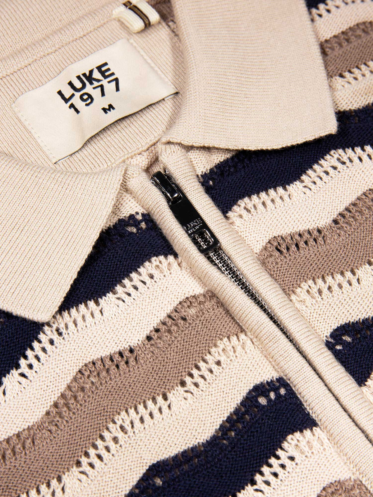 Men's navy jumper with half-zip neck, detail view 1