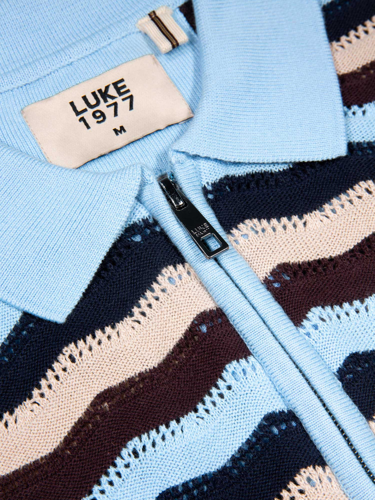 Men's blue jumper with half-zip neck, detail view 1
