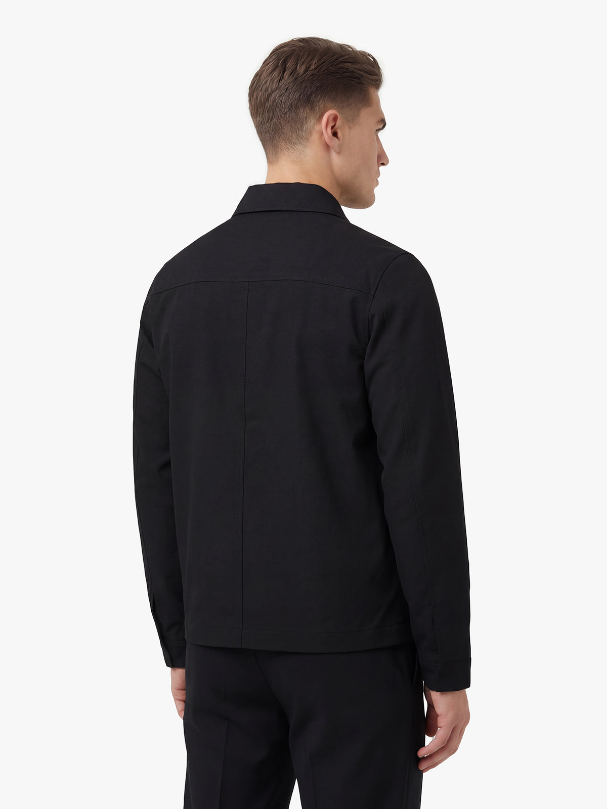 Men's black jacket with snap-button front and front pocket, detail view 1