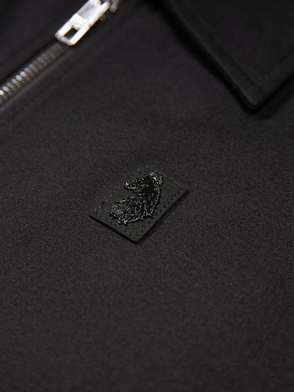 Men's black jacket with snap-button front and front pocket, detail view 3