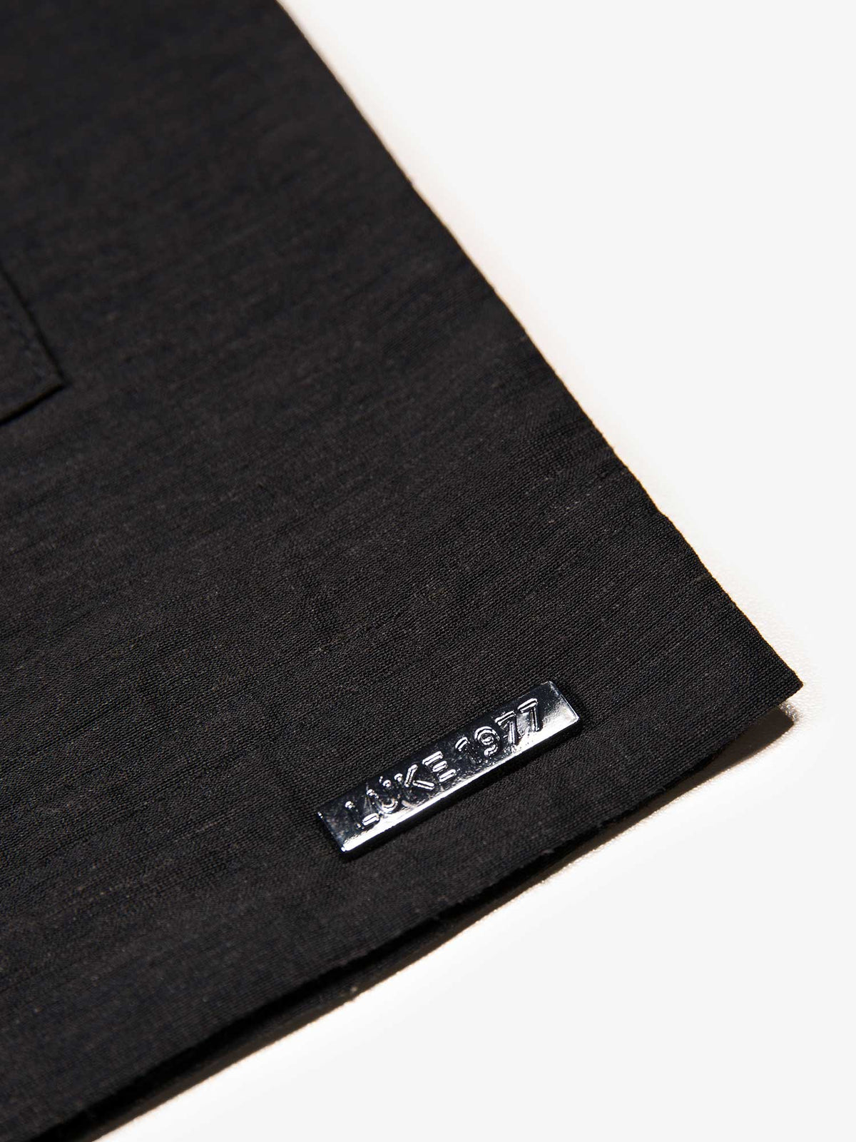 Men's relaxed-fit black shirt with button-up front, detail view 4