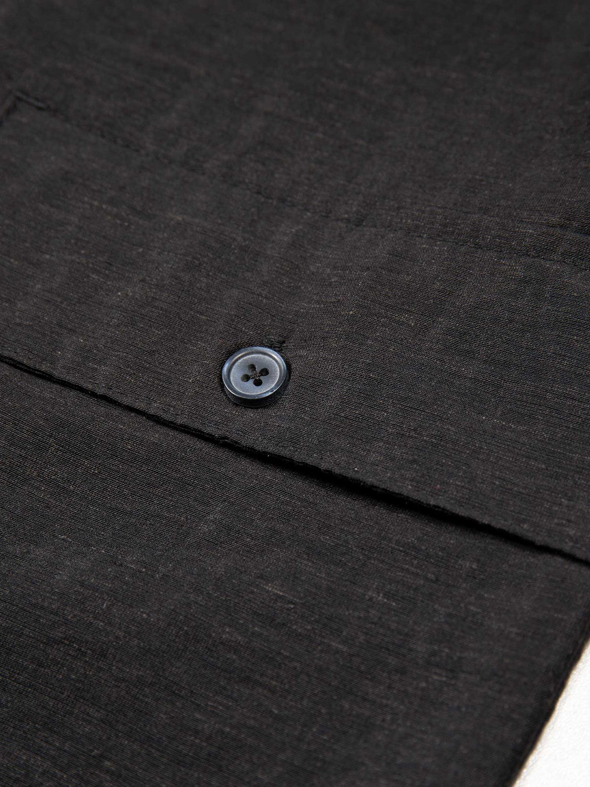 Men's black shorts with drawstring waistband and cargo pockets, detail view 3