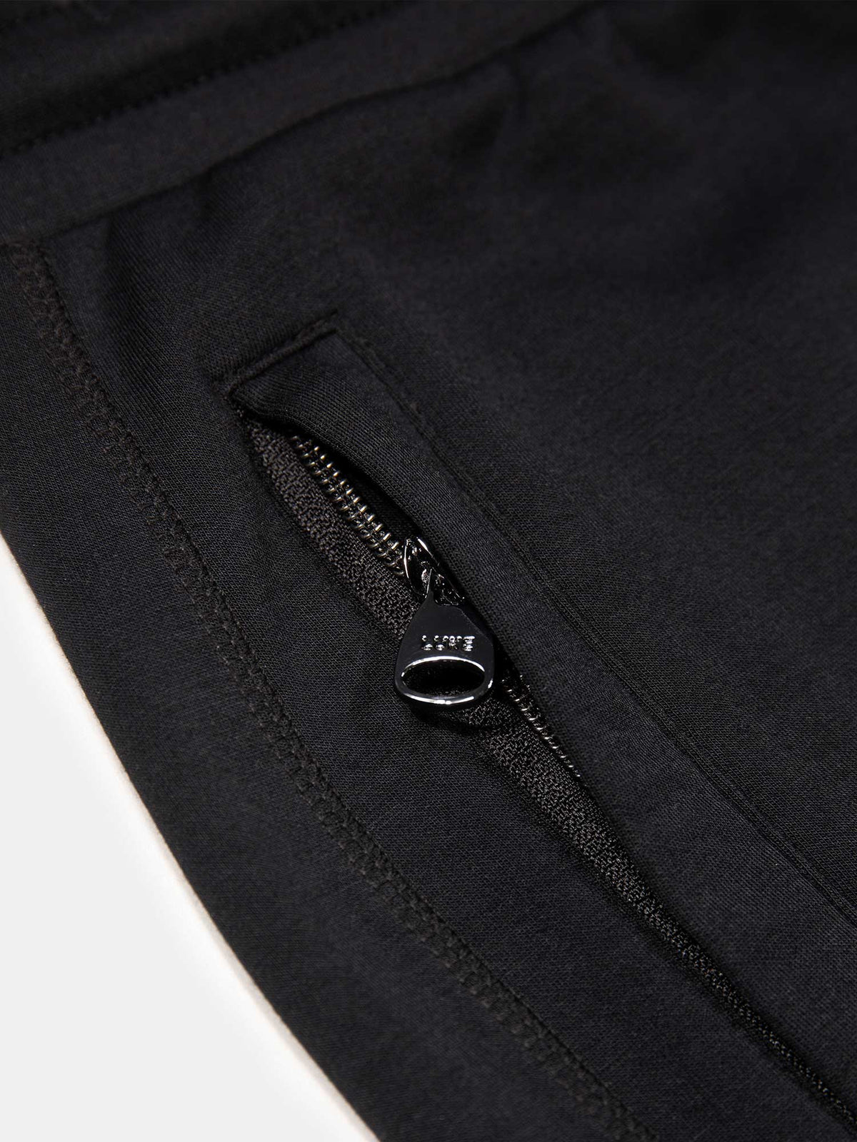 Men's black shorts with drawstring waistband, detail view 2