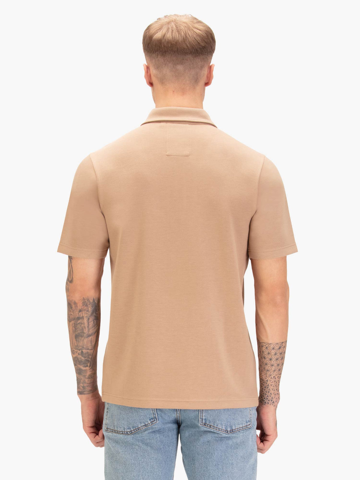 Men's beige polo shirt with polo collar, worn by a model, back view