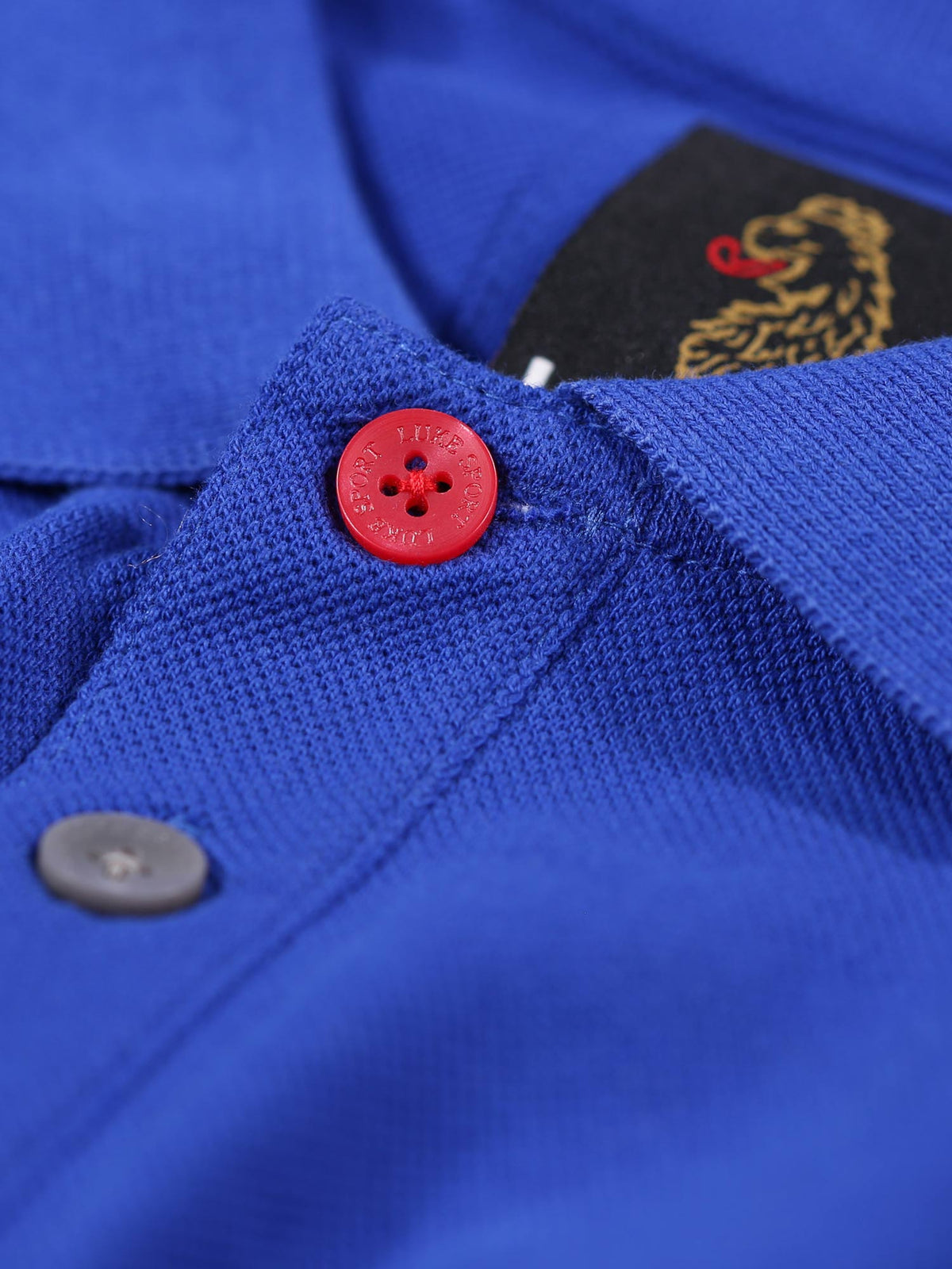 Men's blue polo shirt with polo collar.