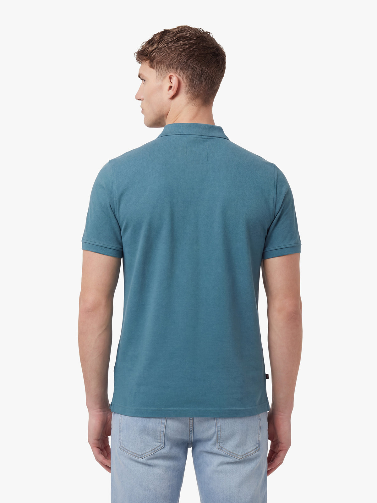 Men's blue polo shirt with polo collar, back view
