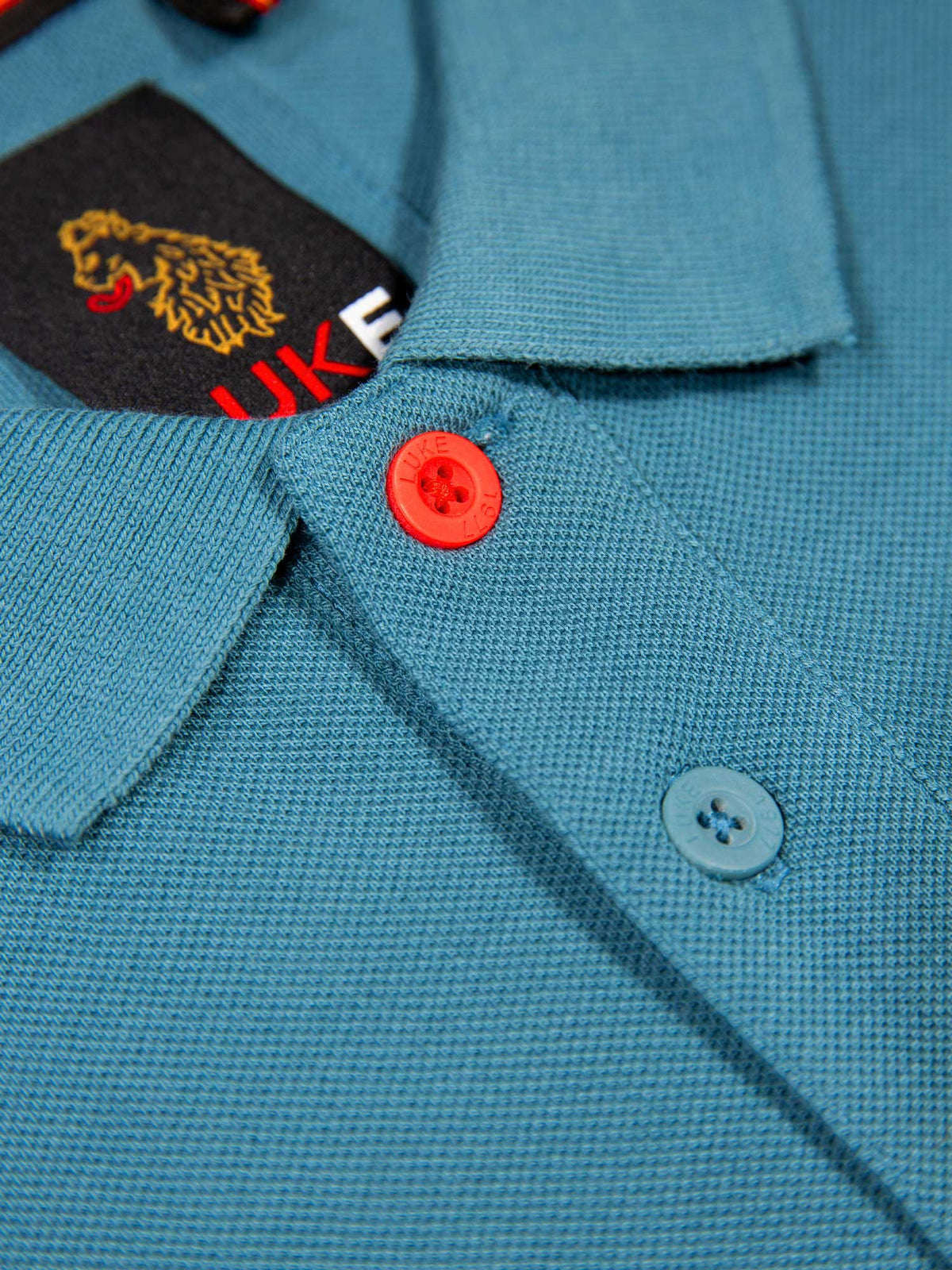 Men's blue polo shirt with polo collar, detail view 1