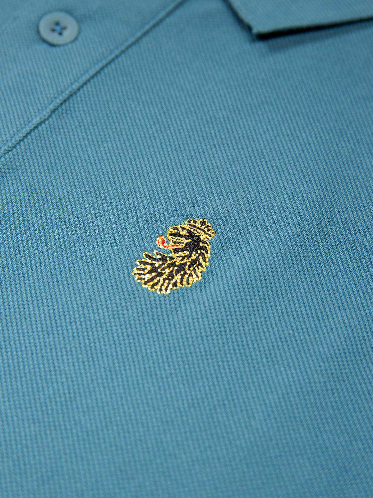 Men's blue polo shirt with polo collar, detail view 2