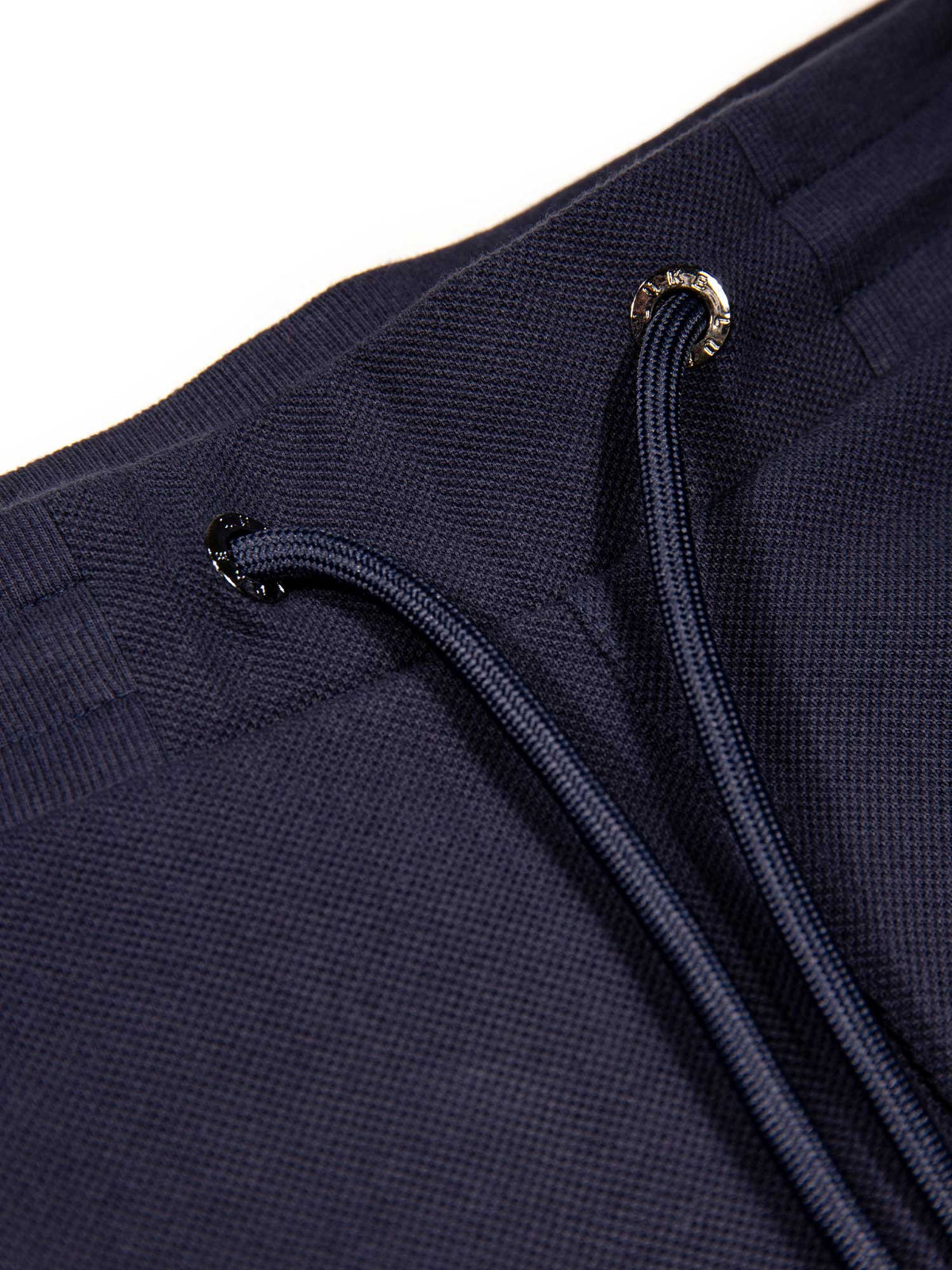 Men's navy short set with short-sleeve shirt and drawstring shorts, detail image.