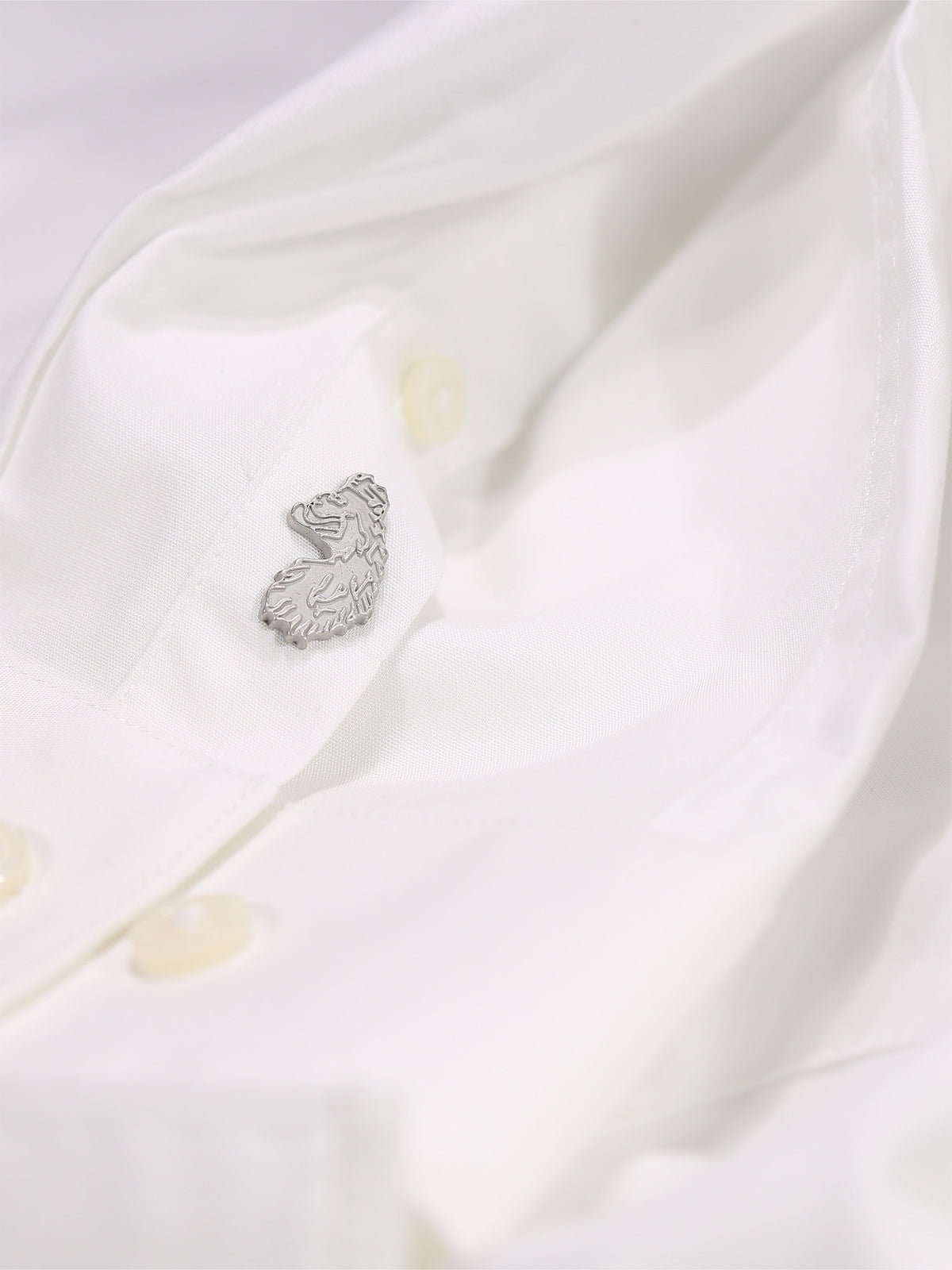 Men's white shirt with button-up front.